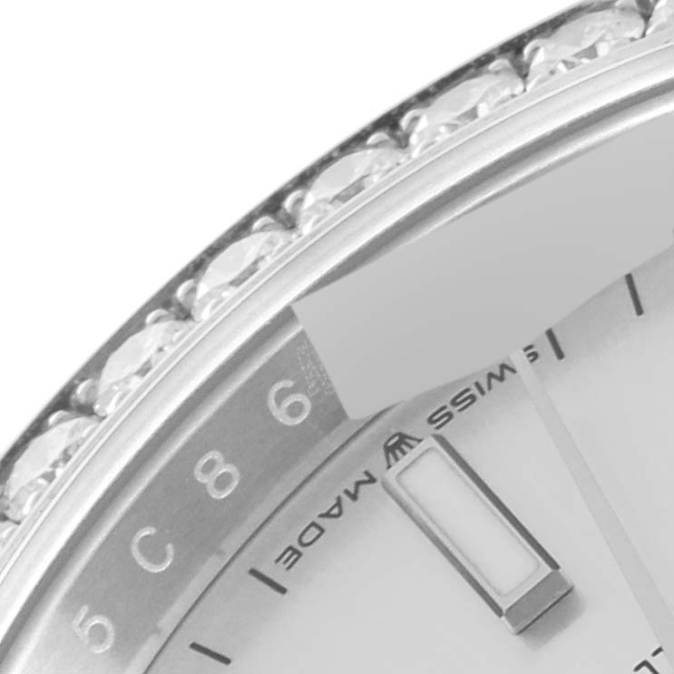 The image shows a close-up of the bezel and part of the dial of a Rolex Datejust 126284 Men's Stainless Steel Silver Dial 126284 Men's Stainless Steel Silver Dial watch, with gem settings and partial hour markers visible.