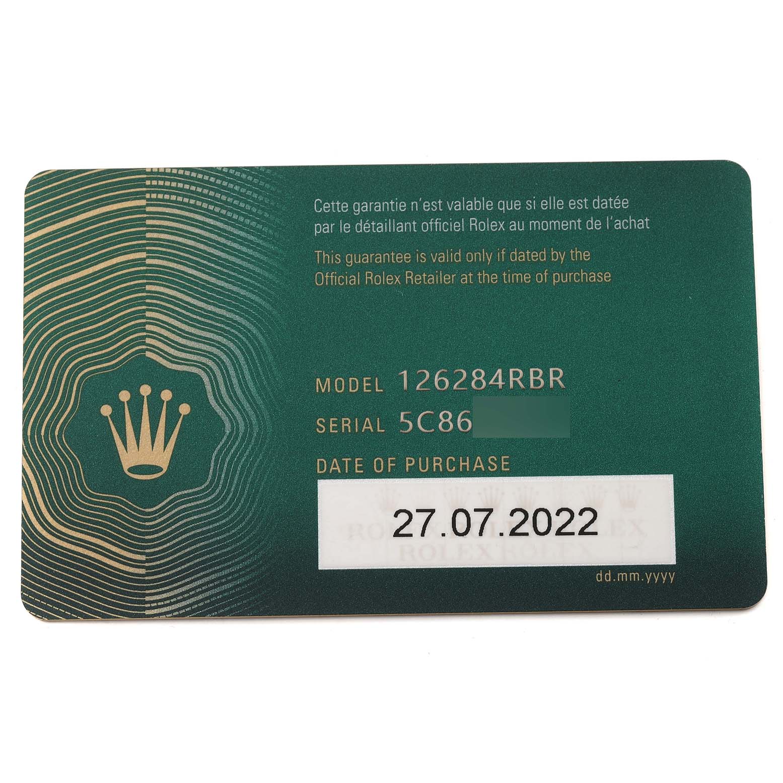 This image shows the warranty card for a Rolex Datejust 126284 Men's Stainless Steel Silver Dial 126284 Men's Stainless Steel Silver Dial model 126284RBR watch.