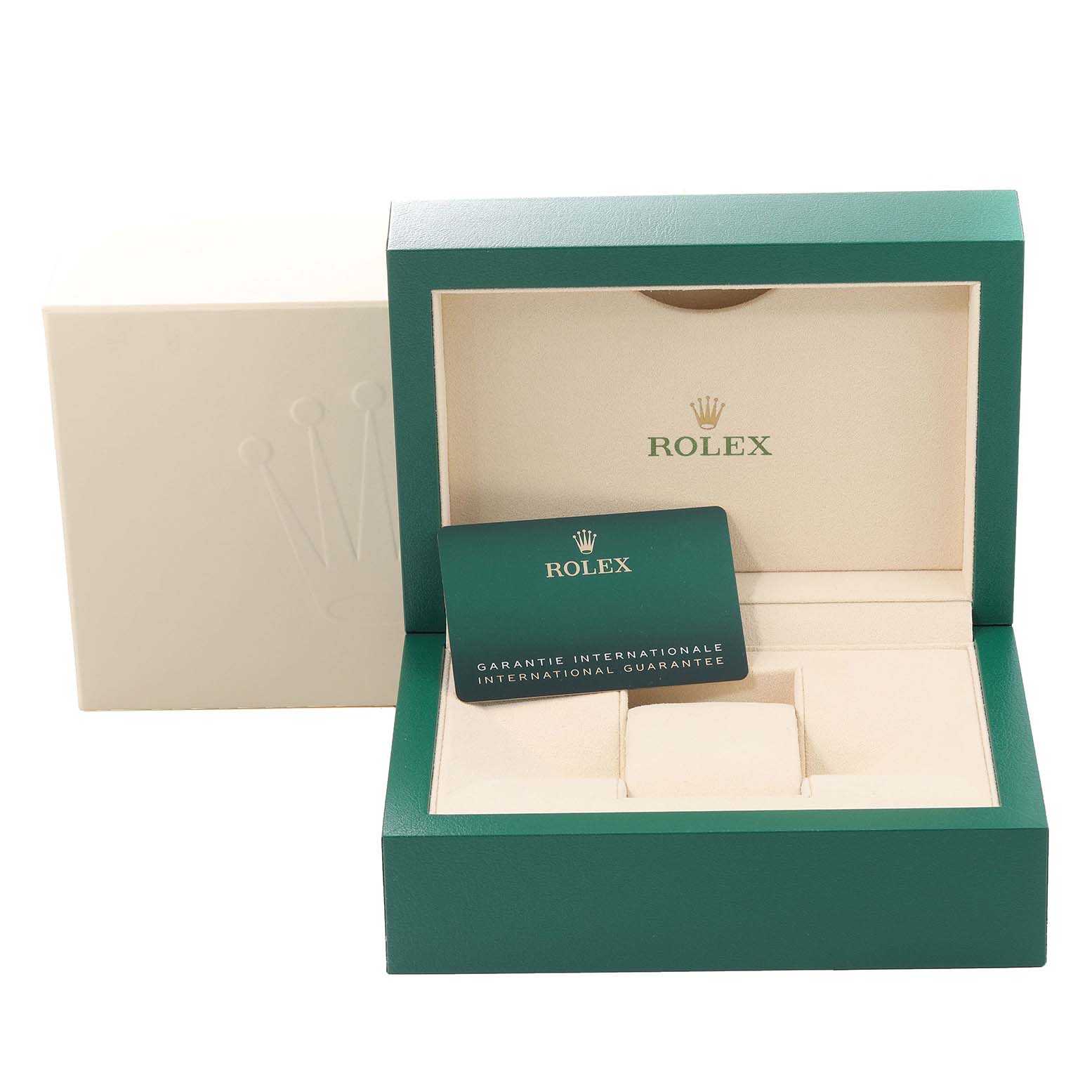 This image shows the open green-and-cream box and international guarantee card for a Rolex Datejust 126284 Men's Stainless Steel Silver Dial 126284 Men's Stainless Steel Silver Dial model watch.