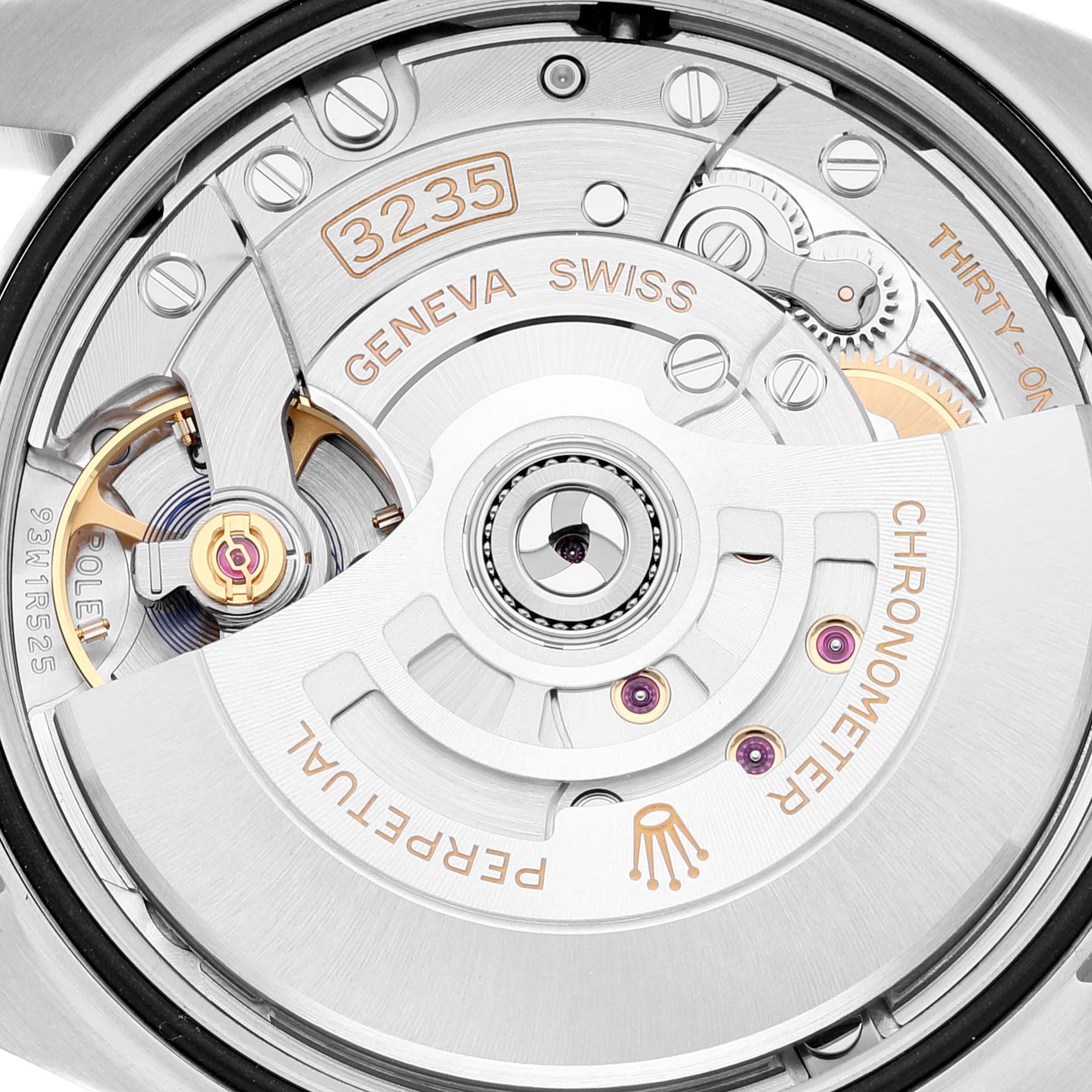 The image shows the movement mechanism and rotor of a Rolex Datejust 126284 Men's Stainless Steel Silver Dial 126284 Men's Stainless Steel Silver Dial watch, highlighting the intricate inner workings.