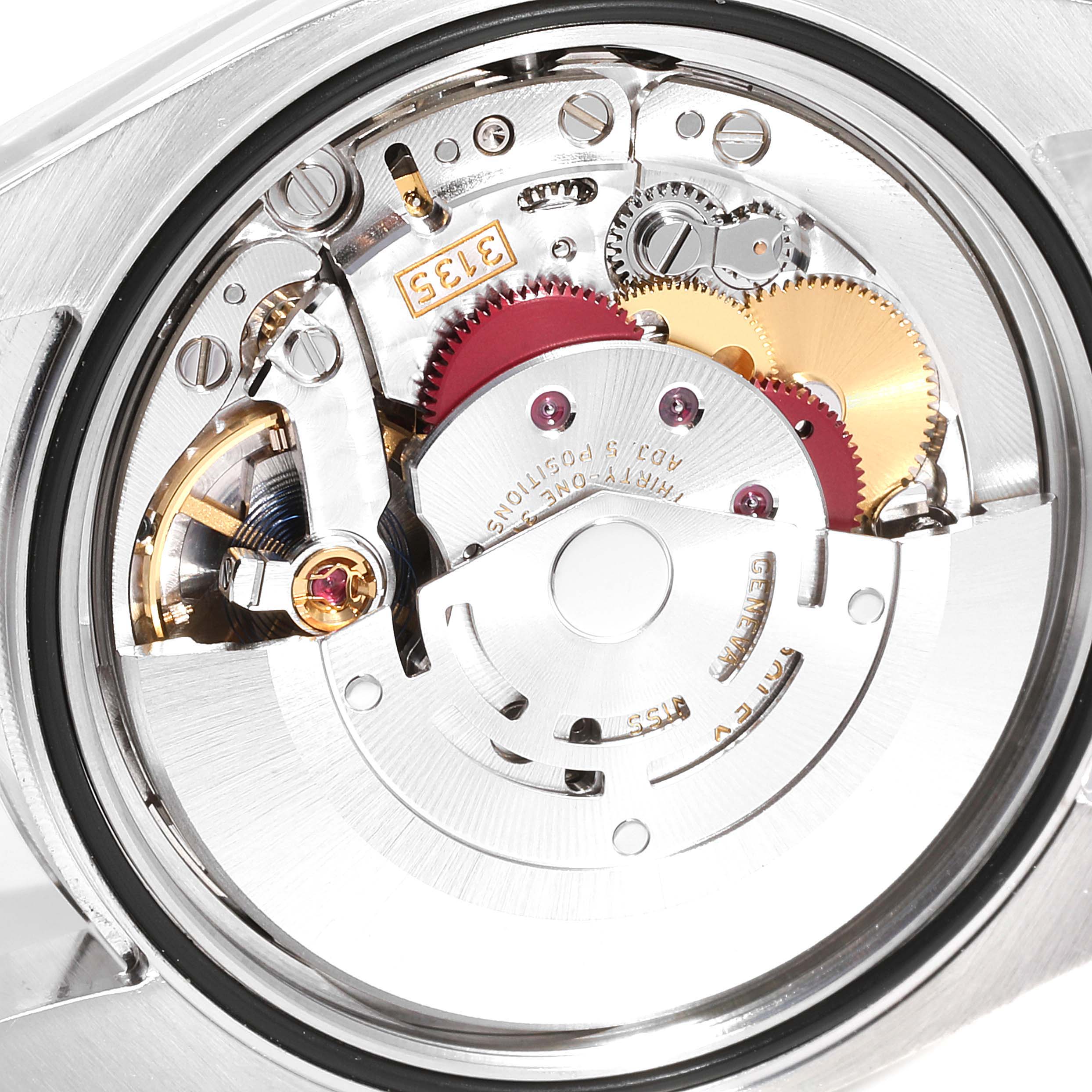 The image shows the internal mechanical movement of the Rolex Datejust 116234 Men's Stainless Steel Black Dial 116234 Men's Stainless Steel Black Dial watch from a top-down angle.