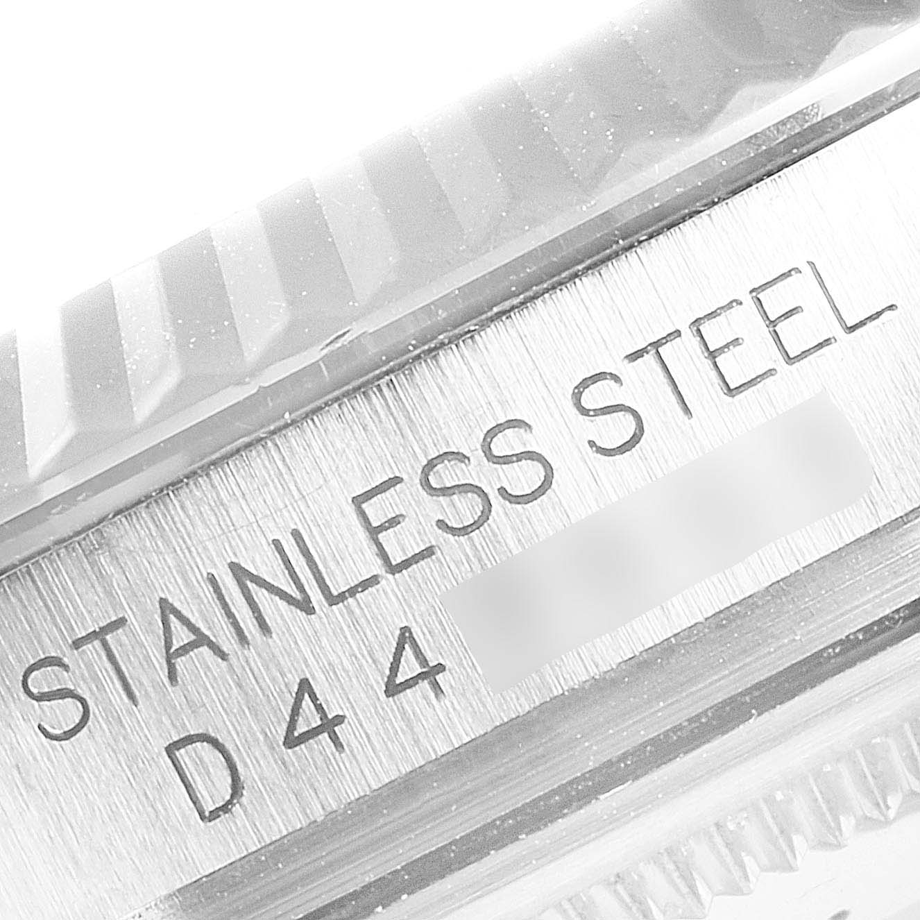 The image shows a close-up view of the stainless steel engraving on the Rolex Datejust 116234 Men's Stainless Steel Black Dial 116234 Men's Stainless Steel Black Dial watch.