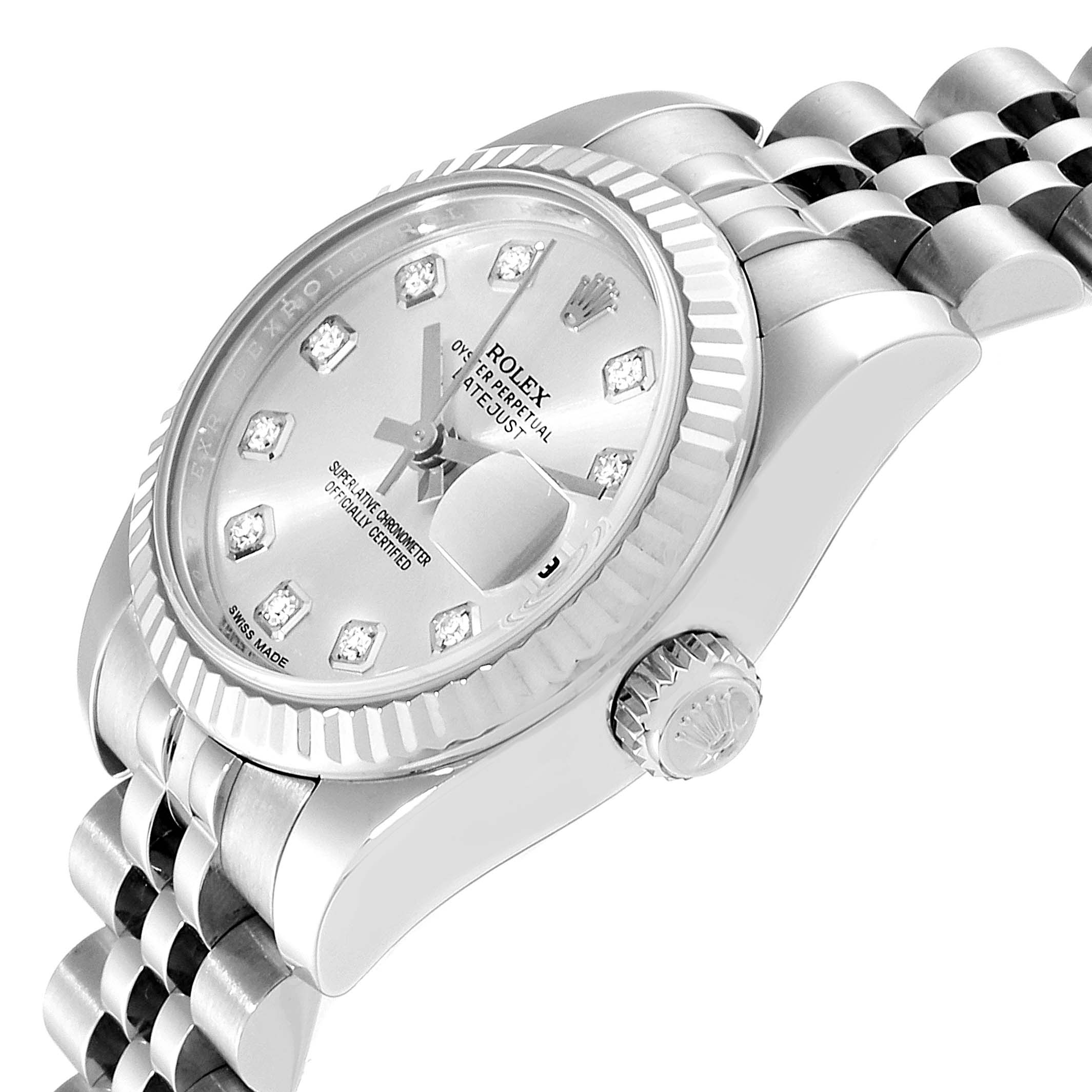 This image shows a close-up side angle of a Rolex Datejust 179174 Women's Stainless Steel Silver Dial 179174 Women's Stainless Steel Silver Dial watch, highlighting the dial, crown, and part of the bracelet.