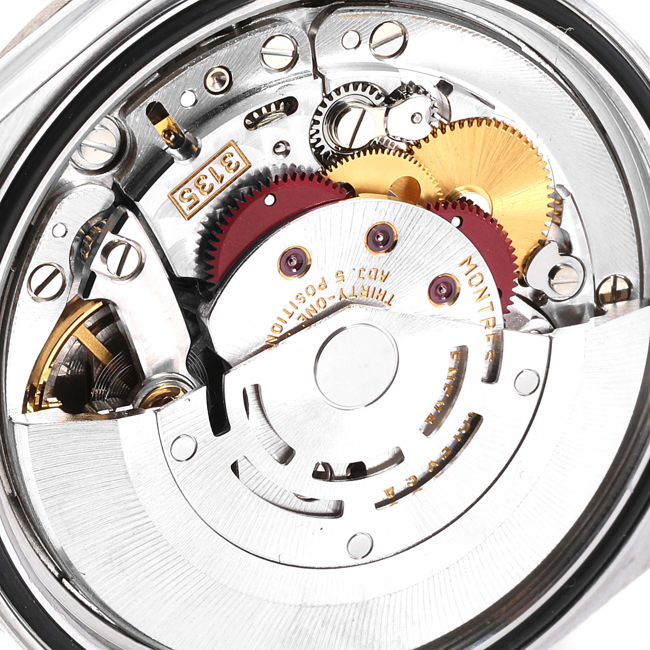 This is a close-up view of the inner mechanical movement of a Rolex Datejust 16234 Men's Stainless Steel Silver Dial 16234 Men's Stainless Steel Silver Dial watch, showcasing its intricate gears and components.