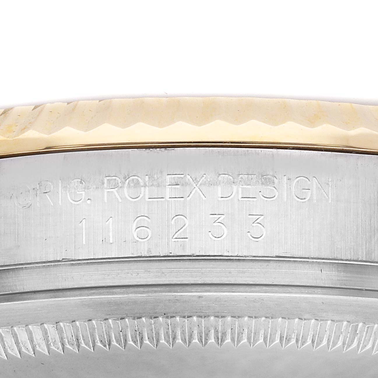 The image shows a close-up of the side of the Rolex Datejust 116233 Men
s Steel and Gold (two tone) Champagne Dial, featuring the model number engraving on the watch case.