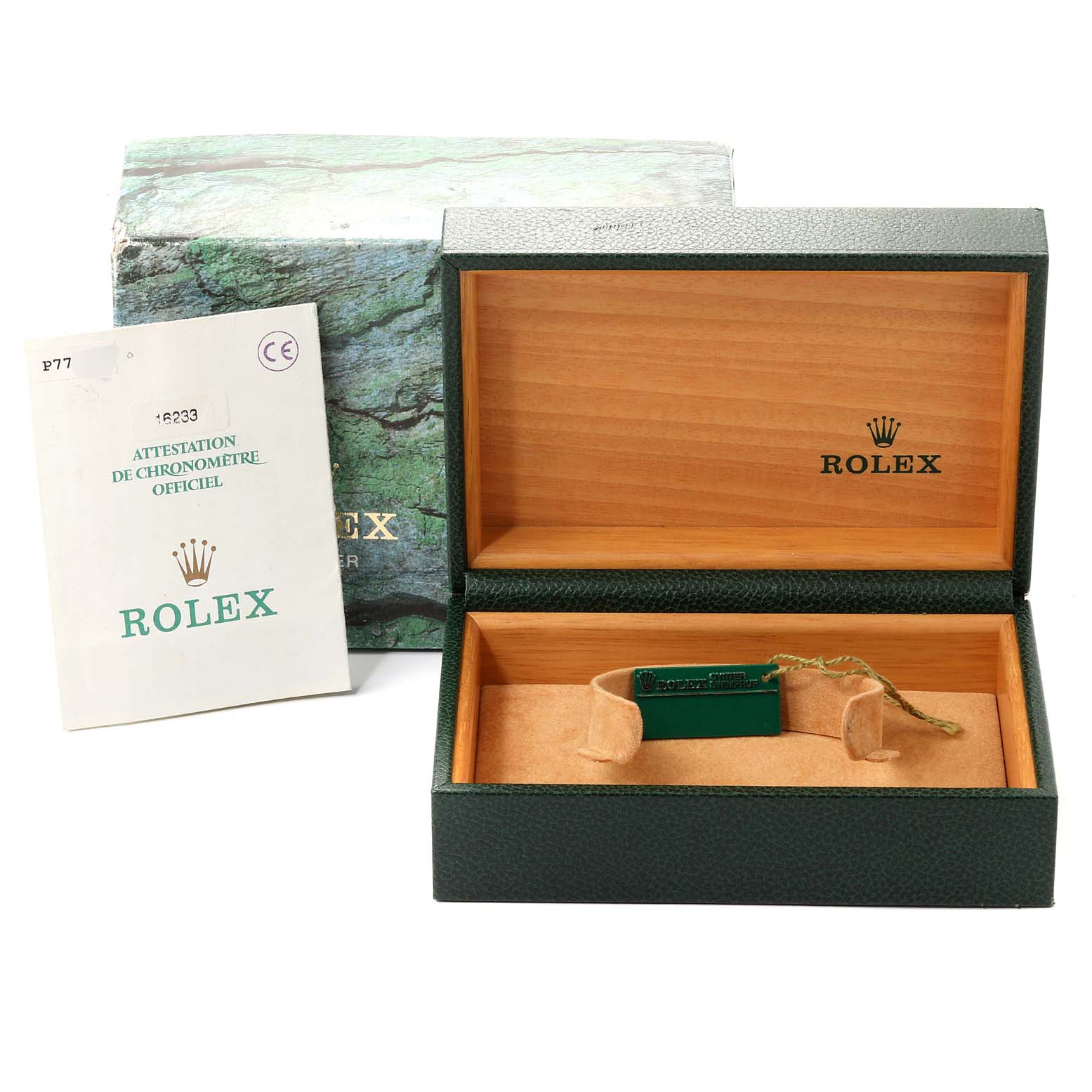 This image shows the open box and certificate for a Rolex Datejust 16233 Men's Steel and Gold (two tone) Blue Dial 16233 Men's Steel and Gold (two tone) Blue Dial watch, with the box partially empty.