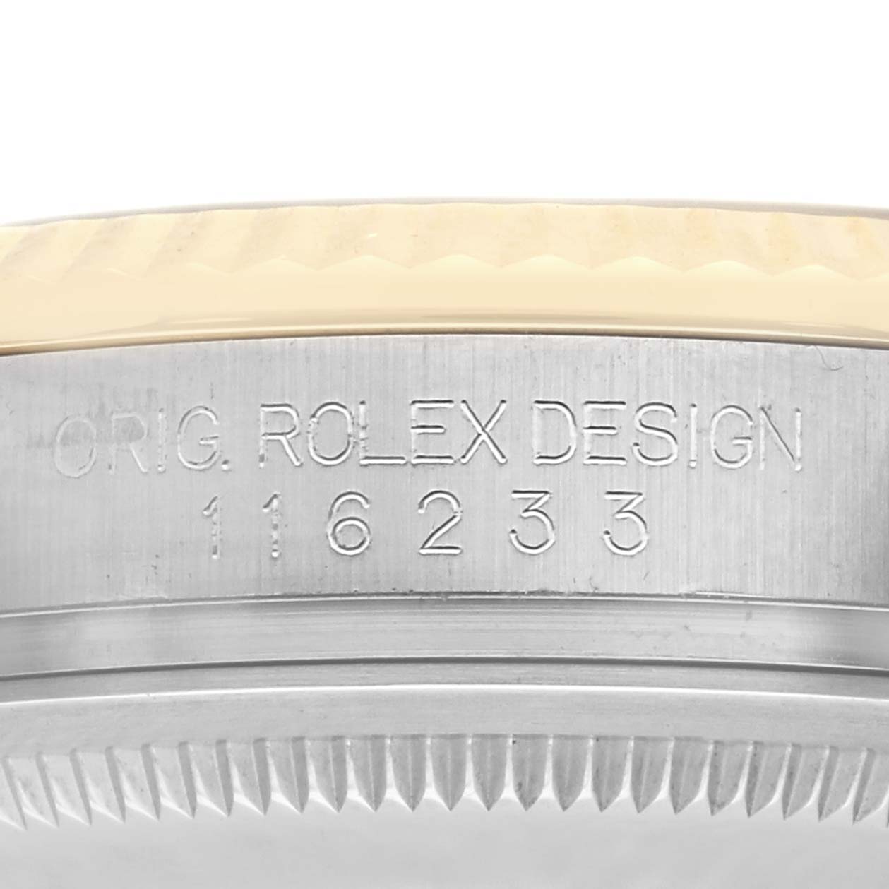 The image shows a close-up of the engraved case side with text on a Rolex Datejust 116233 Men
s Steel and Gold (two tone) Silver Dial.