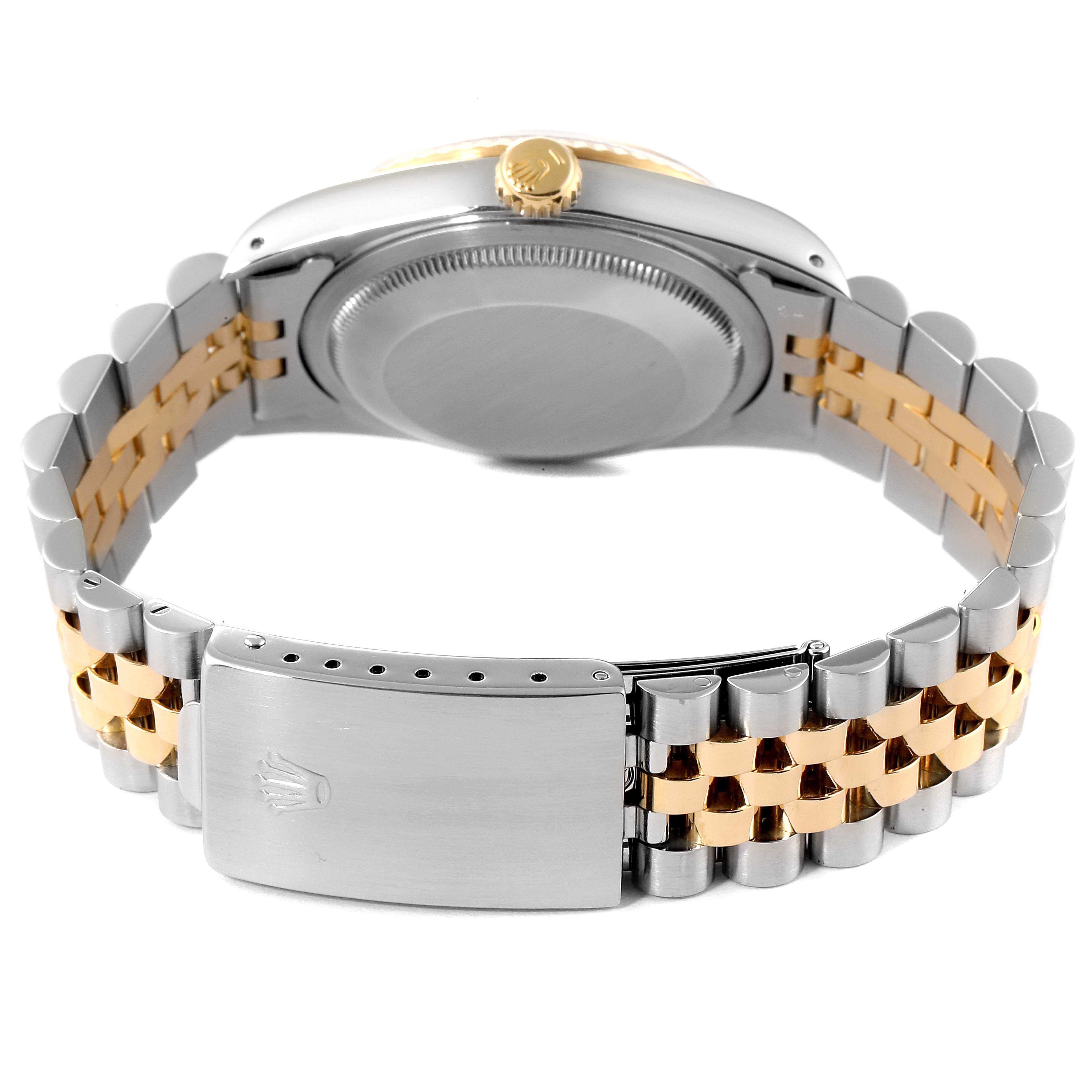 The image shows the back of the Rolex Datejust 16233 Men's Steel and Gold (two tone) Blue Dial 16233 Men's Steel and Gold (two tone) Blue Dial watch, highlighting the two-tone bracelet, clasp, and case back.