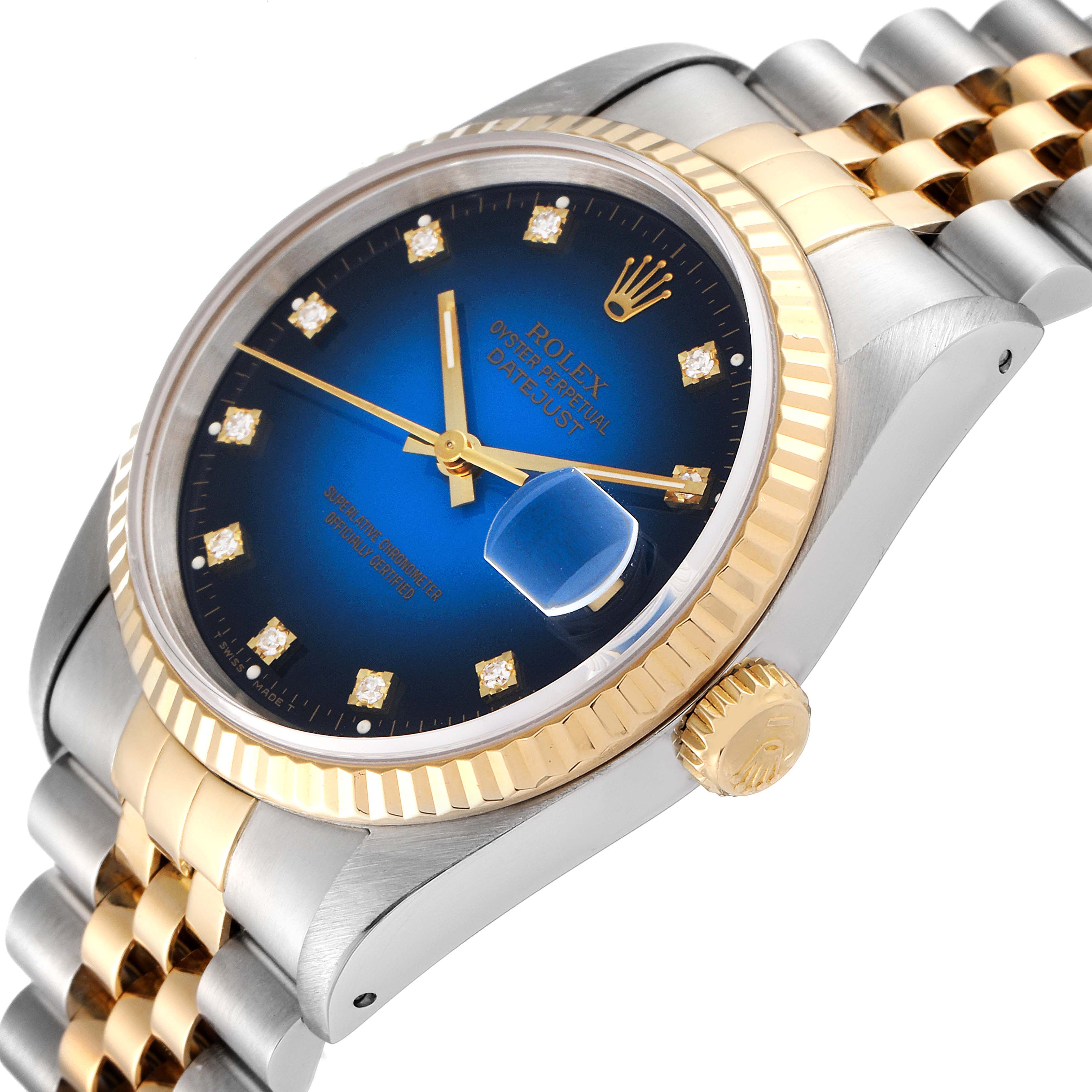 The image shows a close-up angle of the Rolex Datejust 16233 Men's Steel and Gold (two tone) Blue Dial 16233 Men's Steel and Gold (two tone) Blue Dial watch featuring its dial, bezel, crown, and part of the bracelet.