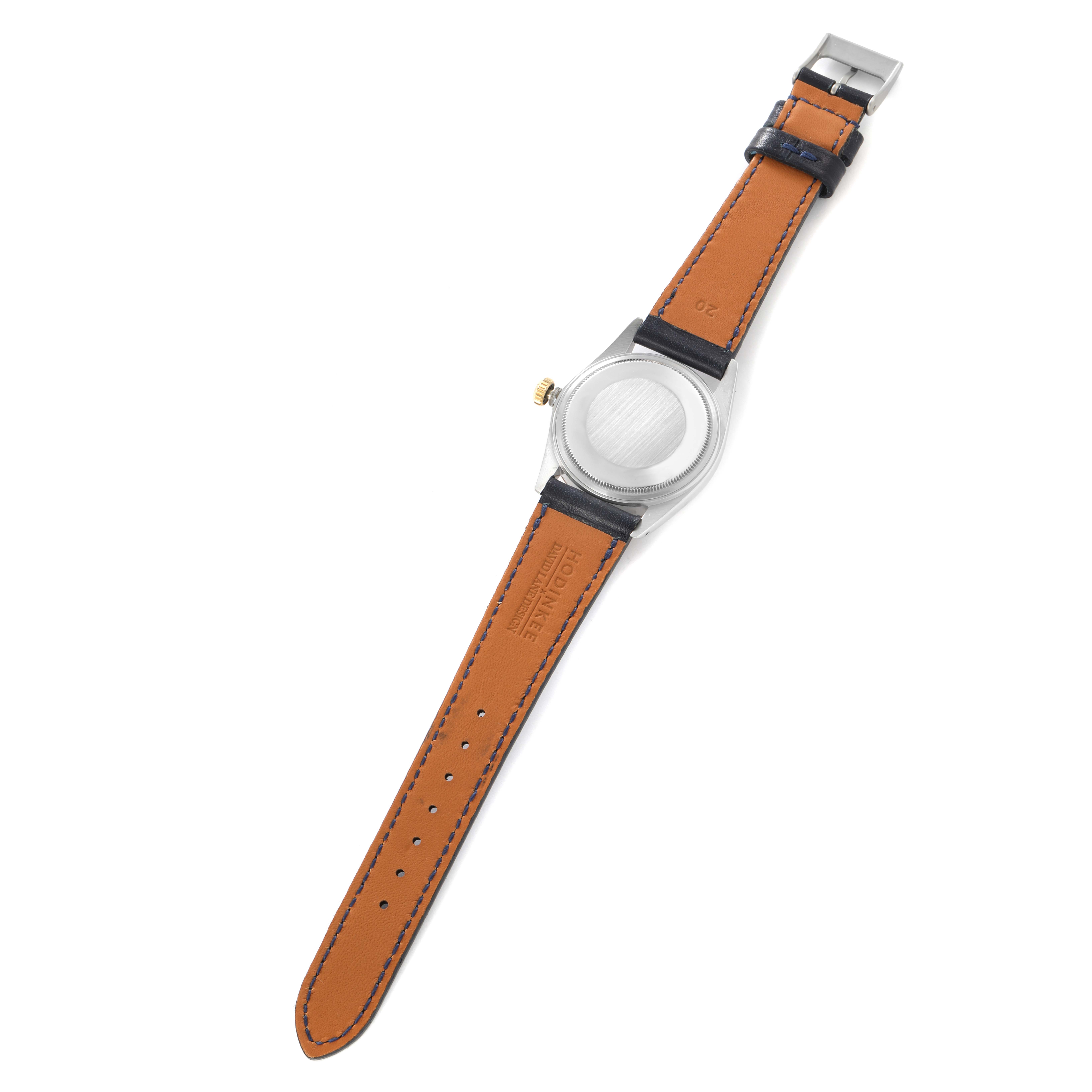 The image shows the back of the Rolex Vintage Collection 16013 Men
s Steel and Gold (two tone) Champagne Dial watch, with the strap and caseback visible.