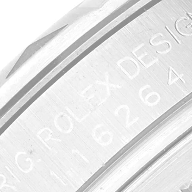 This image shows an extreme close-up of the engraved inner bezel of the Rolex Turn-o-Graph 116264 Men
s Stainless Steel Black Dial 116264 Men
s Stainless Steel Black Dial watch.