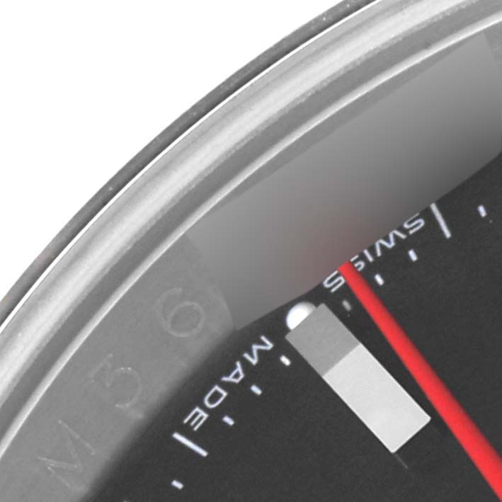Close-up of a Rolex Turn-o-Graph 116264 Men's Stainless Steel Black Dial 116264 Men's Stainless Steel Black Dial watch showing part of the bezel, dial, and "SWISS MADE" marking.