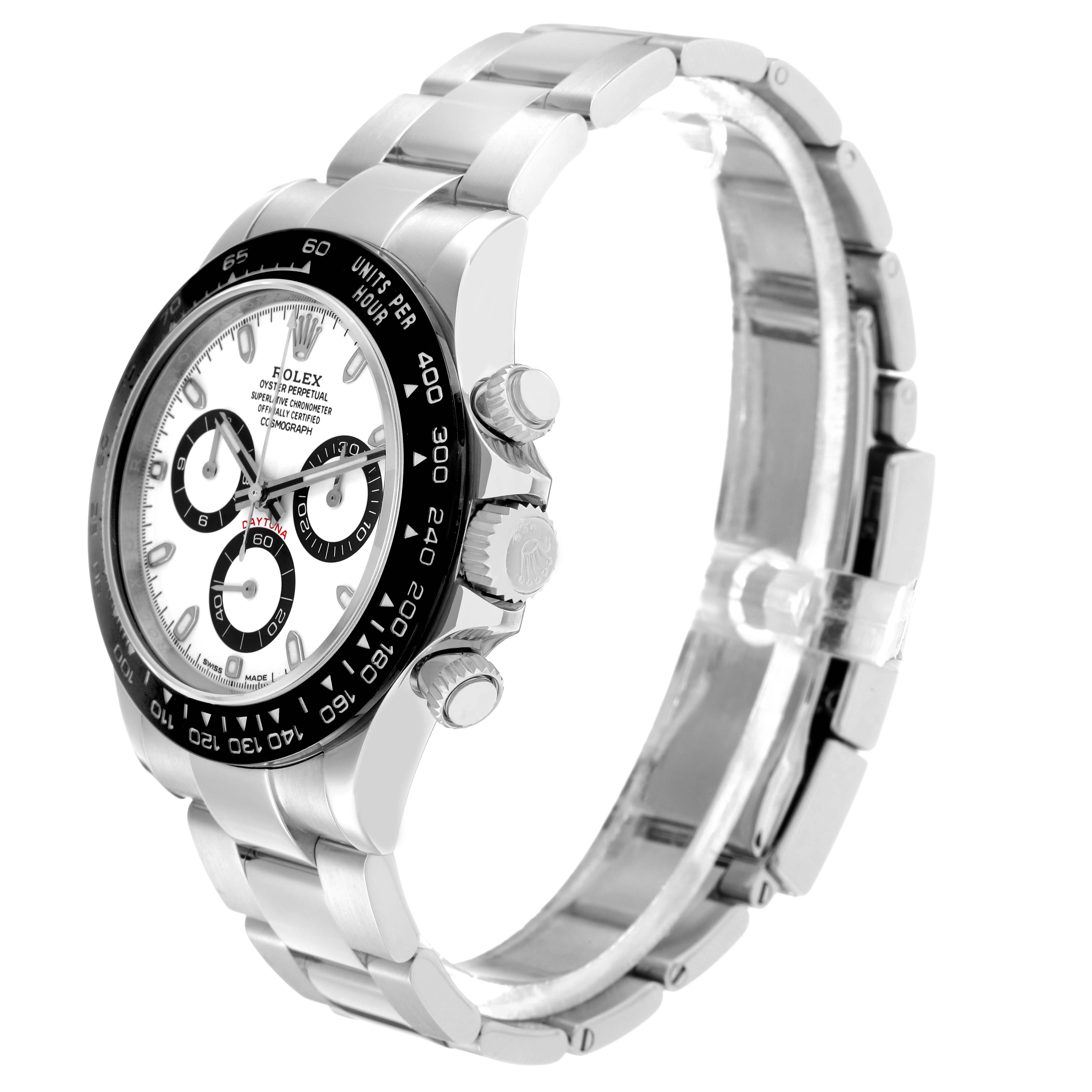 The image shows a Rolex Daytona 116500 Men
s Stainless Steel White Dial watch at a three-quarter angle, highlighting the dial, bezel, pushers, and bracelet.