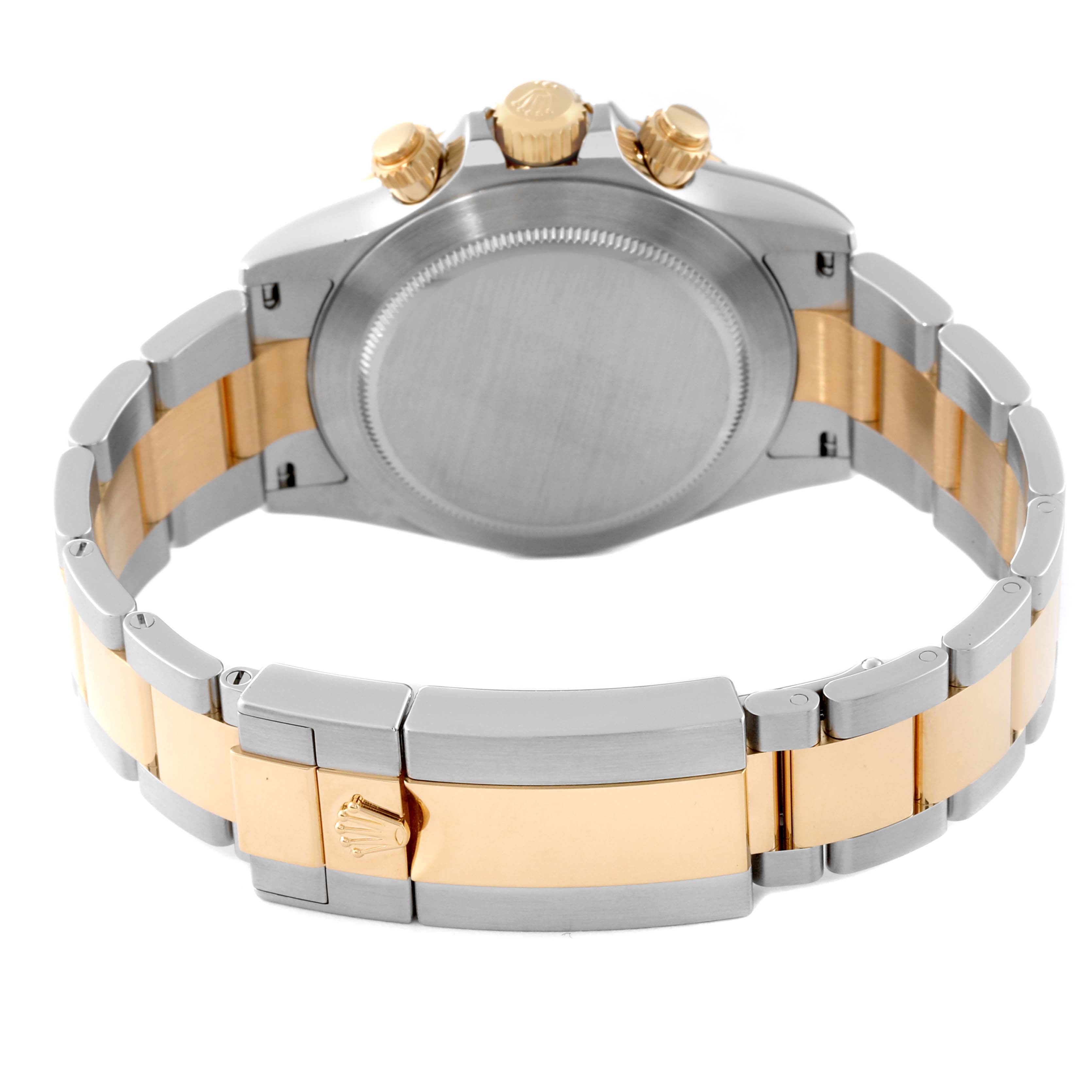 The image shows the back and bracelet of the Rolex Daytona 116503 Men's Steel and Gold (two tone) Mother of Pearl Dial 116503 Men's Steel and Gold (two tone) Mother of Pearl Dial watch, highlighting its two-tone metal design.