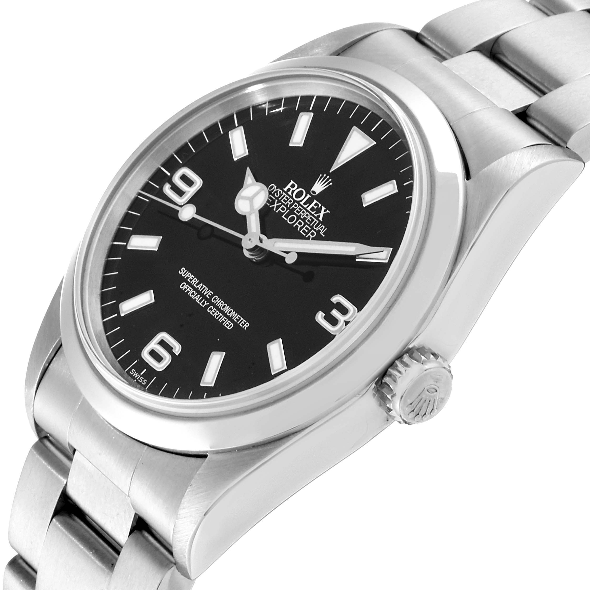 The image shows a side and partial top view of the Rolex Explorer 114270 Men
s Stainless Steel Black Dial 114270 Men
s Stainless Steel Black Dial watch, highlighting its dial, bezel, and bracelet.