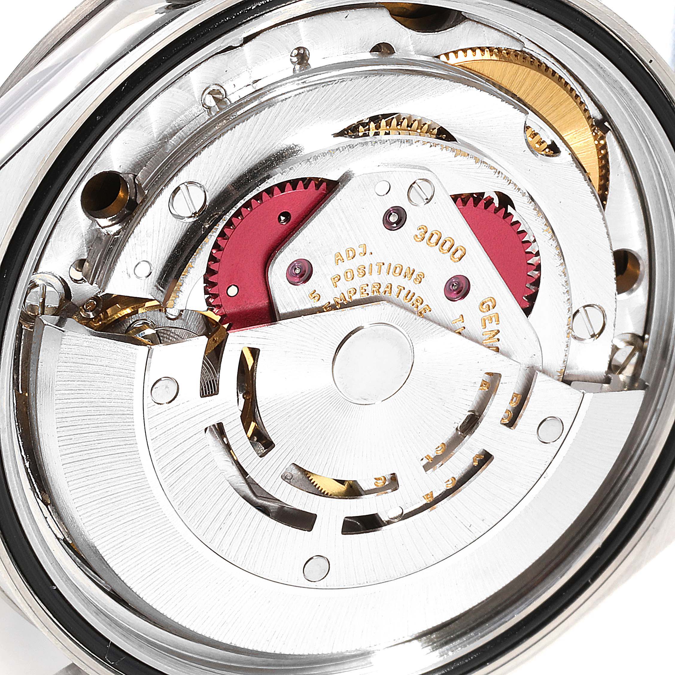 The image shows a close-up of the Rolex Explorer 114270 Men
s Stainless Steel Black Dial 114270 Men
s Stainless Steel Black Dial watch movement, highlighting its intricate inner mechanisms.