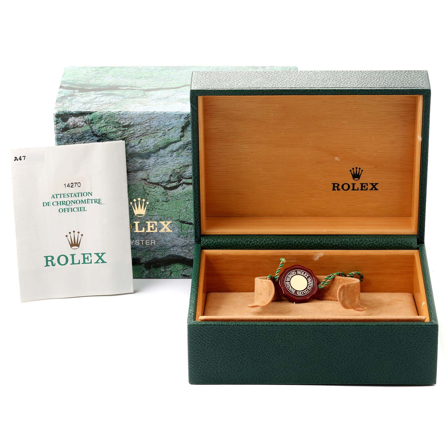 The image shows the packaging, including a green box and certificate, for the Rolex Explorer 114270 Men
s Stainless Steel Black Dial 114270 Men
s Stainless Steel Black Dial model.