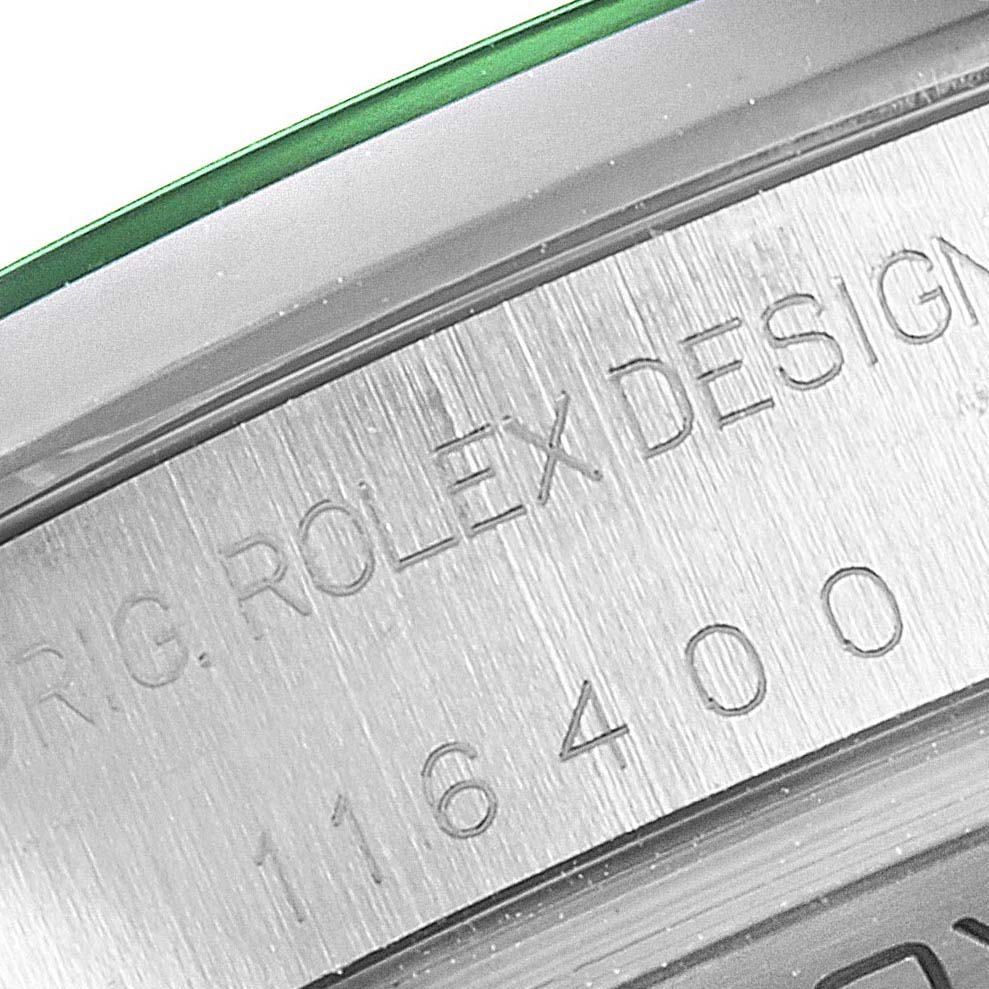 The image shows a close-up of the case side of a Rolex Milgauss 116400GV Men's Stainless Steel Black Dial 116400GV Men's Stainless Steel Black Dial, revealing the engraved model number and "ROLEX DESIGN" inscription.