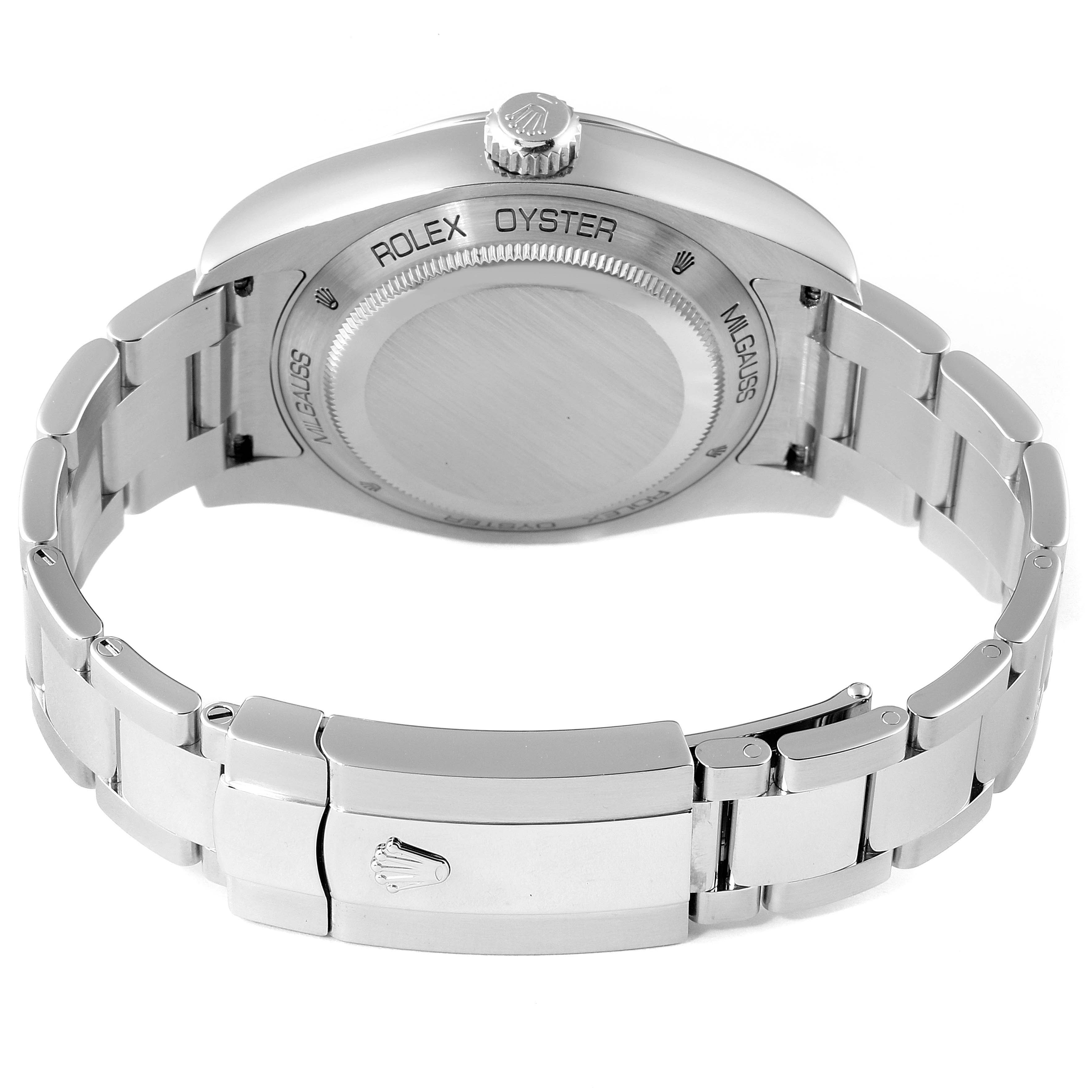 This image shows the back case and bracelet of a Rolex Milgauss 116400 Men's Stainless Steel White Dial 116400 Men's Stainless Steel White Dial watch, including the clasp and crown.