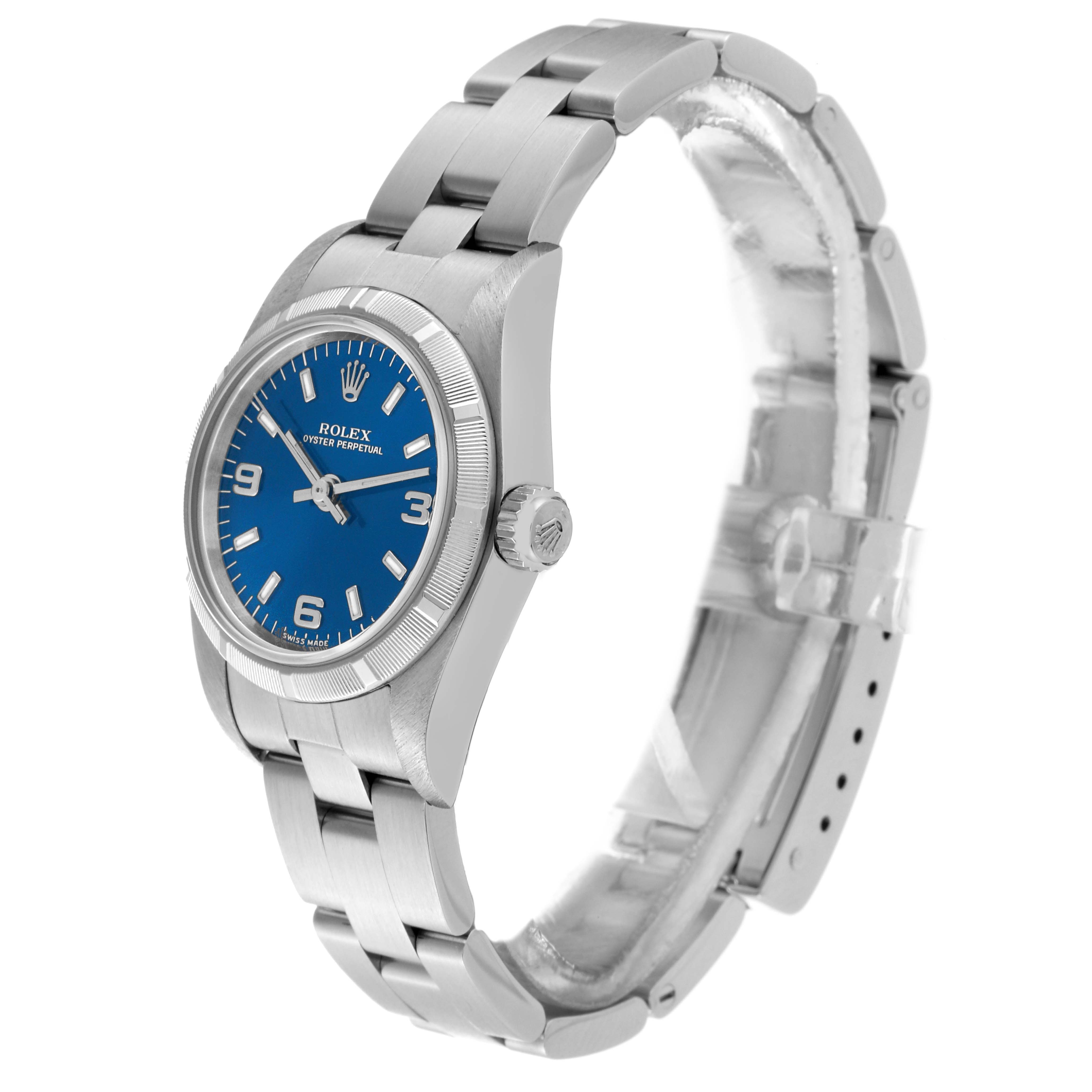 The image shows a side view of a Rolex Oyster Perpetual 76030 Women's Stainless Steel Blue Dial 76030 Women's Stainless Steel Blue Dial watch, highlighting the dial, bezel, and bracelet.