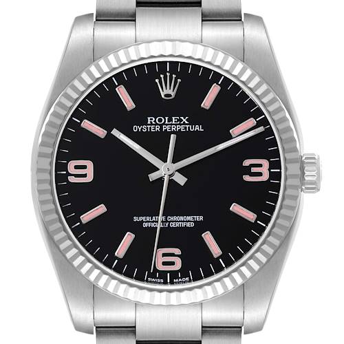 This image shows a front-angle view of a Rolex Oyster Perpetual watch, highlighting its black dial, hour markers, crown, and part of the bracelet.