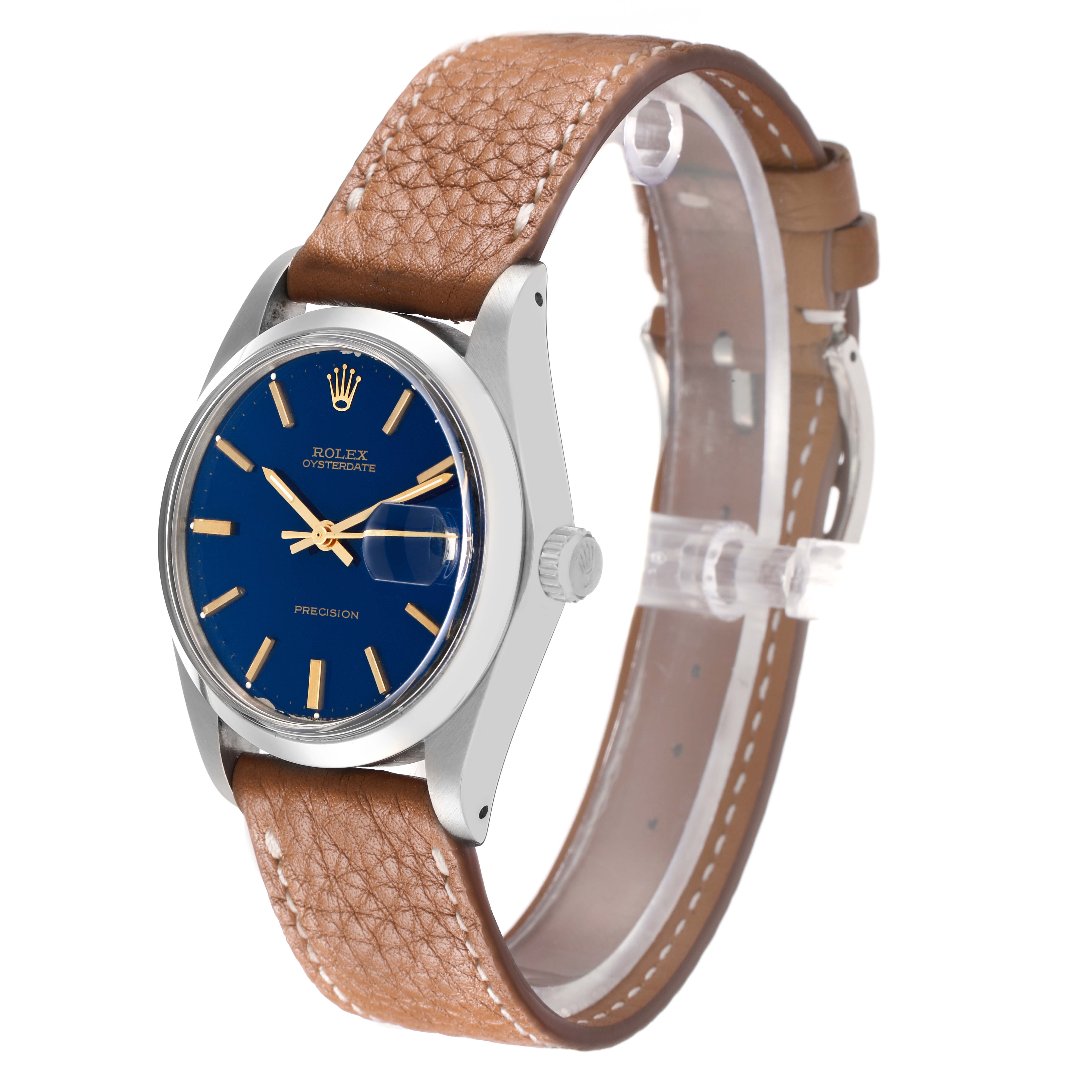 The Rolex Vintage Collection 6694 Men
s Stainless Steel Blue Dial watch is shown at a three-quarter angle, displaying the blue dial, case, and brown leather strap.