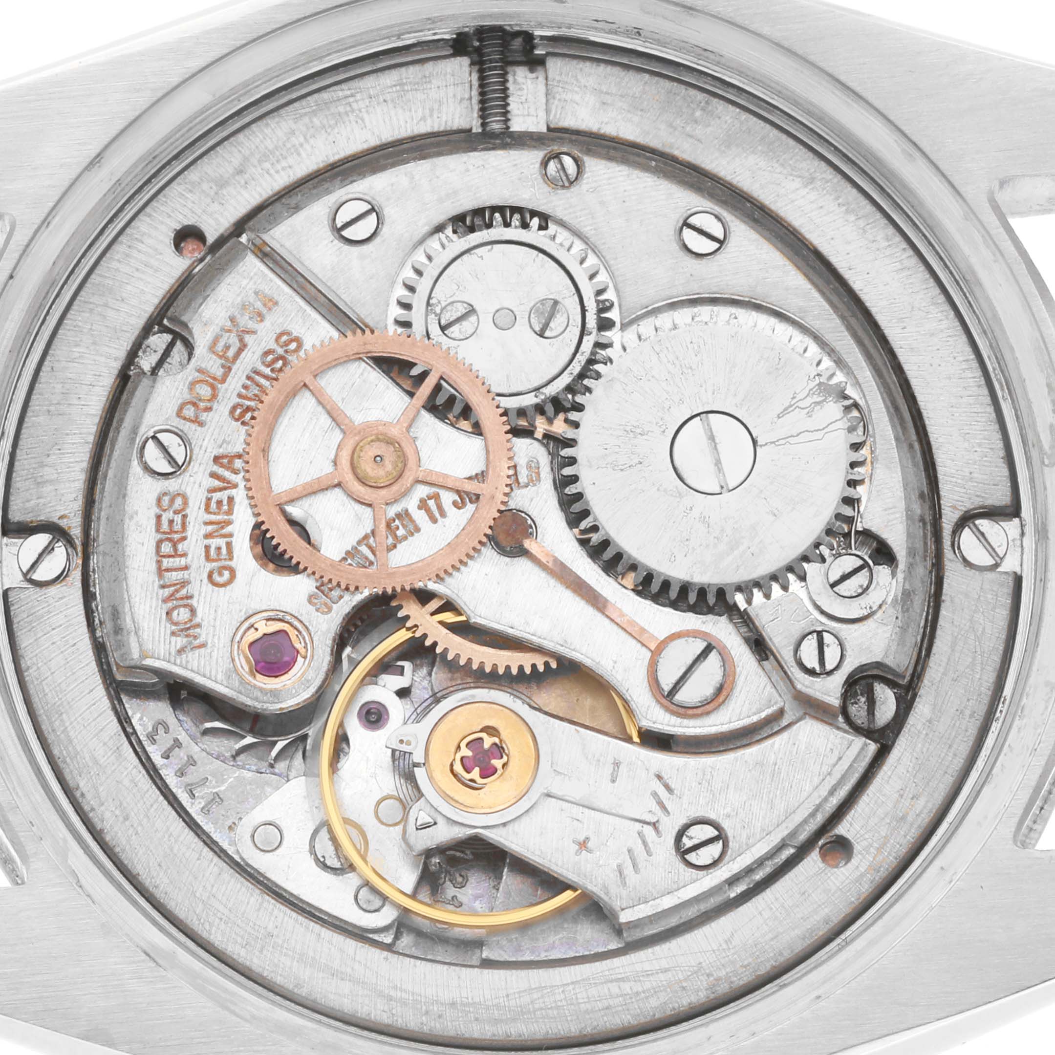 The image shows the mechanical movement of the Rolex Vintage Collection 6694 Men
s Stainless Steel Pink Dial watch from a top-down angle.