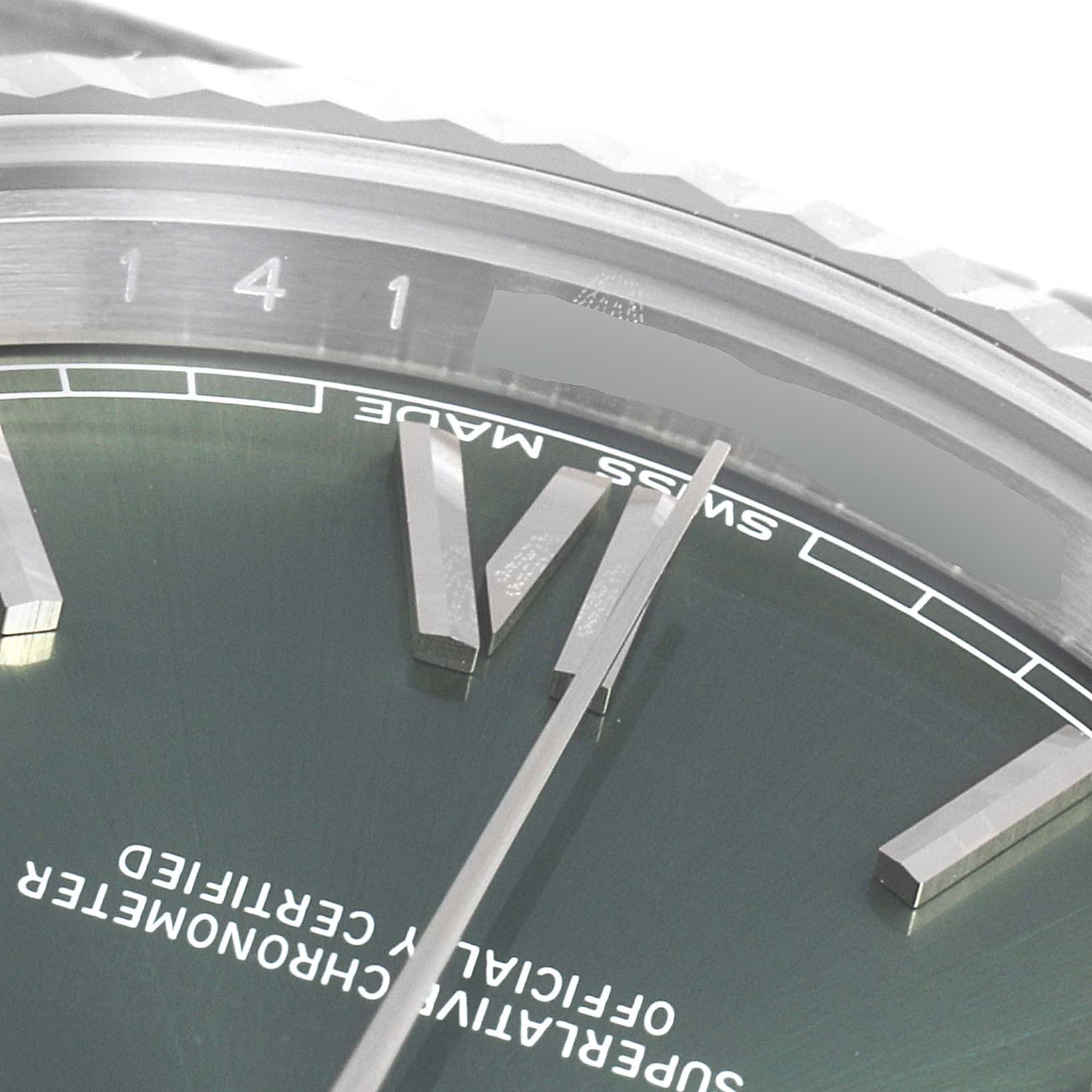 This close-up image shows the dial, hour markers, and part of the bezel of a Rolex President 228239 Men's White Gold Green Dial 228239 Men's White Gold Green Dial model watch.