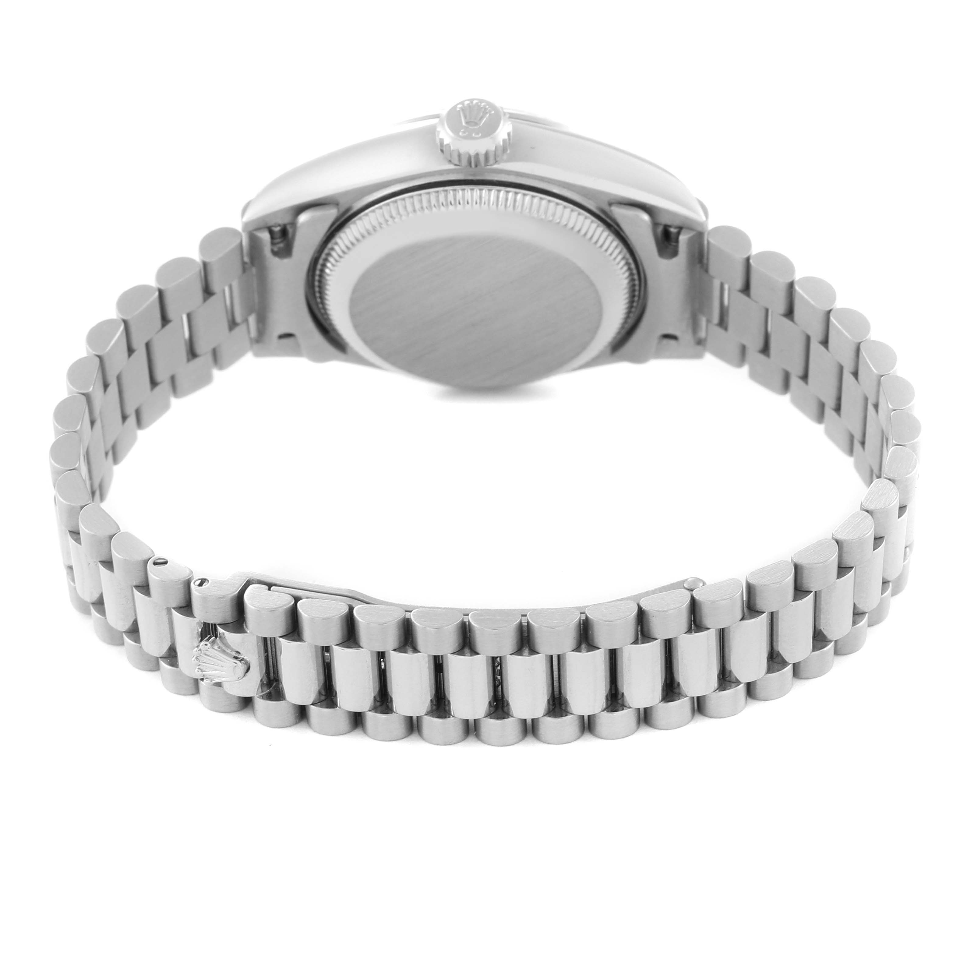 The image shows the back view of a Rolex President 79179 Women's White Gold Mother of Pearl Dial 79179 Women's White Gold Mother of Pearl Dial model watch, including the case back and bracelet.