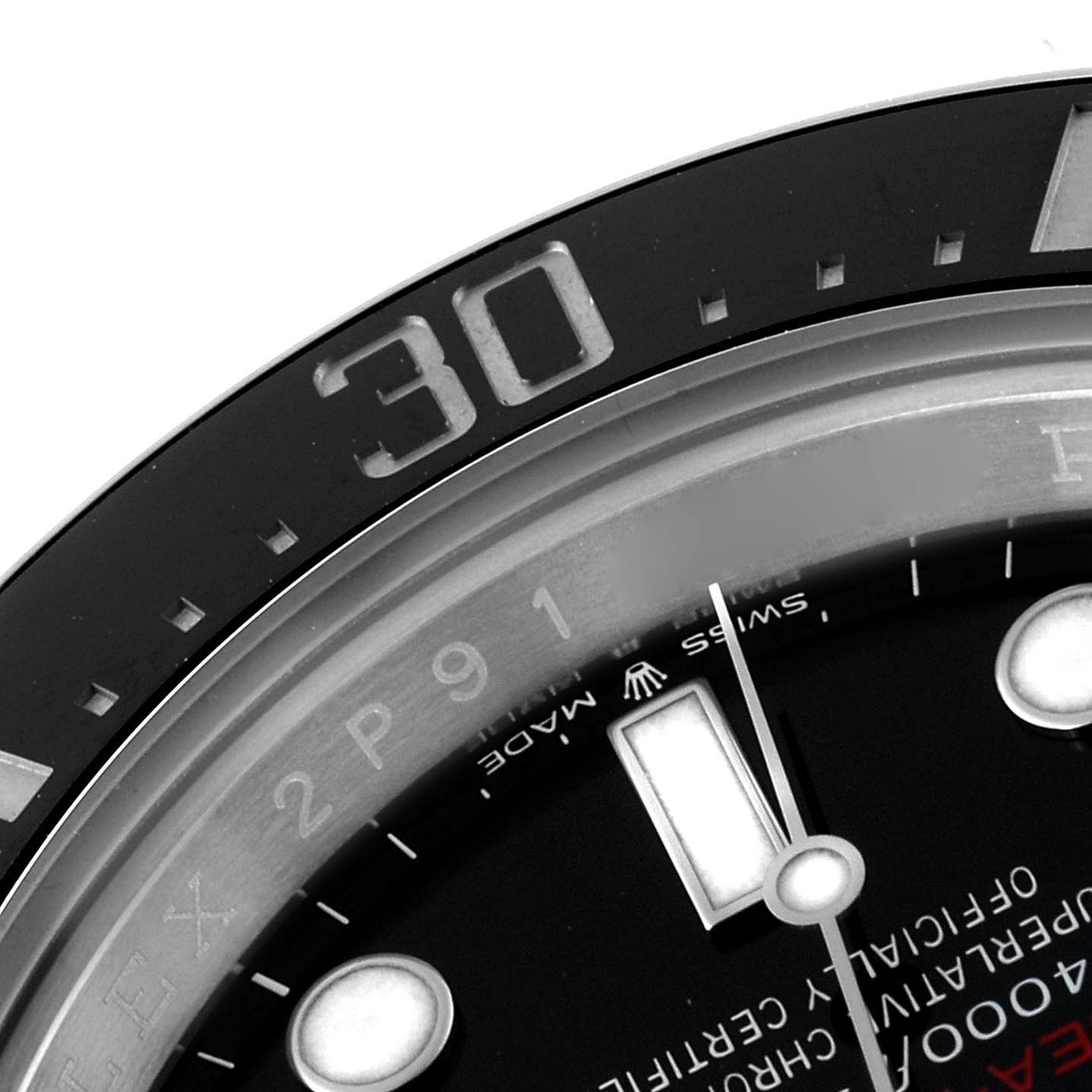 The image shows a close-up of the bezel and dial of a Rolex Sea-Dweller 126600 Men
s Stainless Steel Black Dial watch, highlighting the “30” mark and index details.