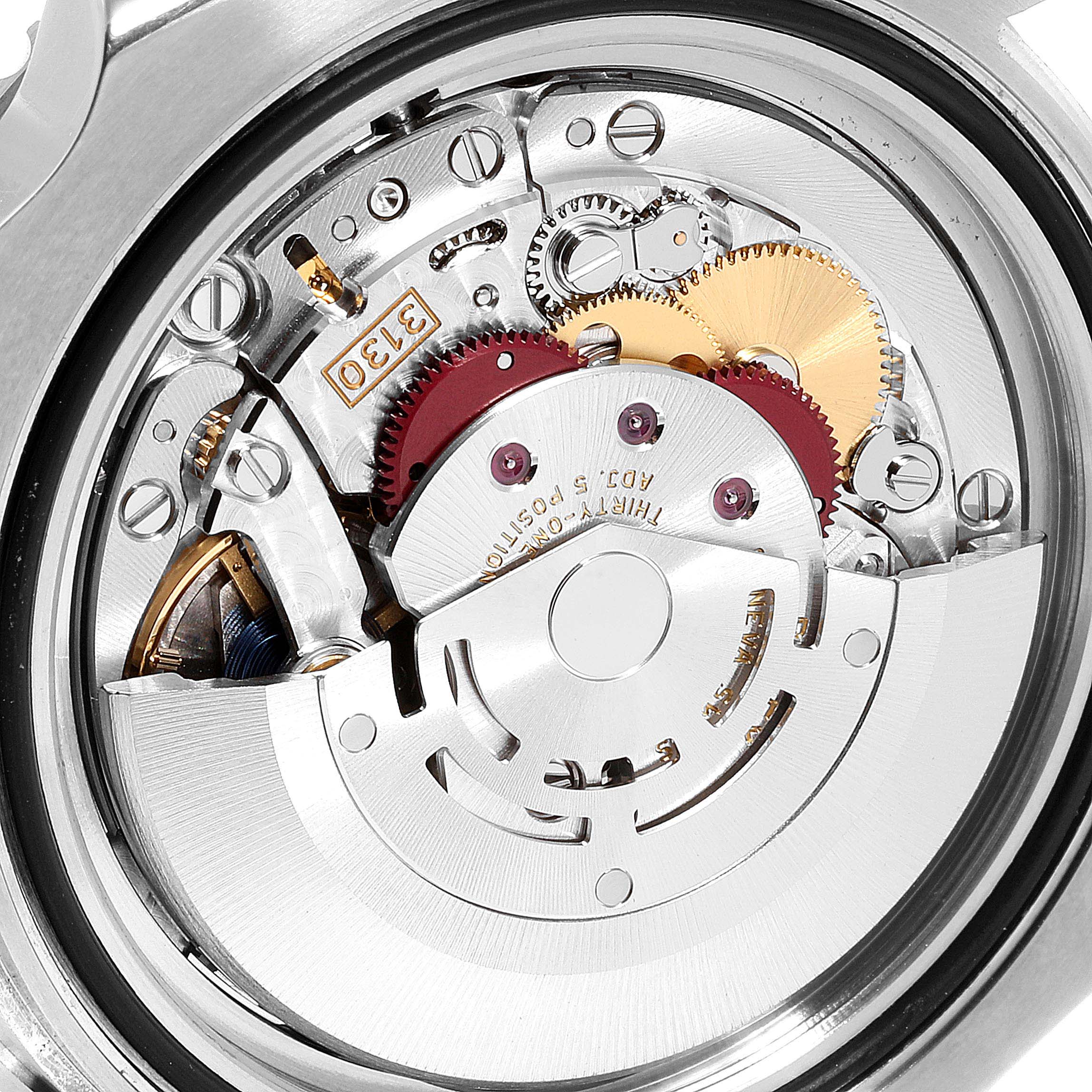 This close-up image shows the intricate mechanical movement inside a Rolex Submariner 114060 Men
s Stainless Steel Black Dial 114060 Men
s Stainless Steel Black Dial watch.