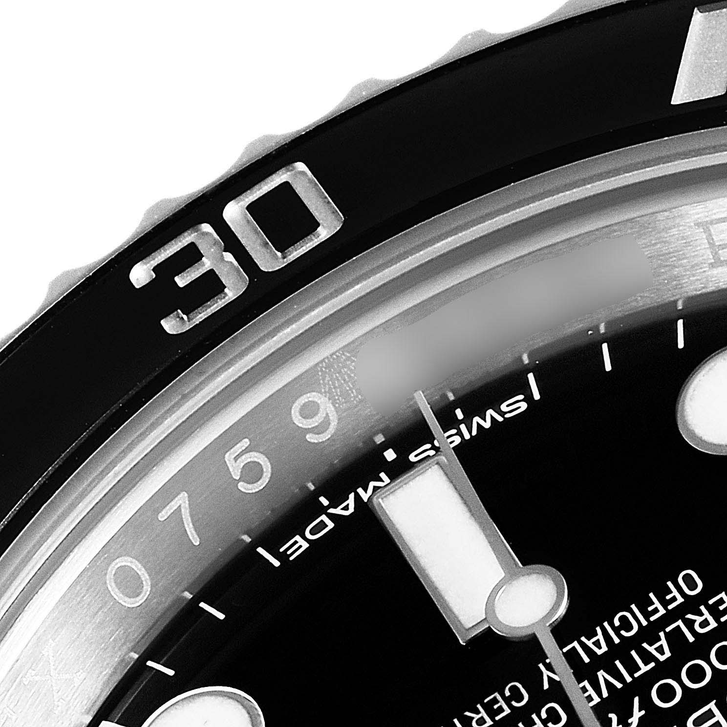 The image shows a close-up of the bezel, part of the dial, and indices of a Rolex Submariner 114060 Men
s Stainless Steel Black Dial 114060 Men
s Stainless Steel Black Dial watch.
