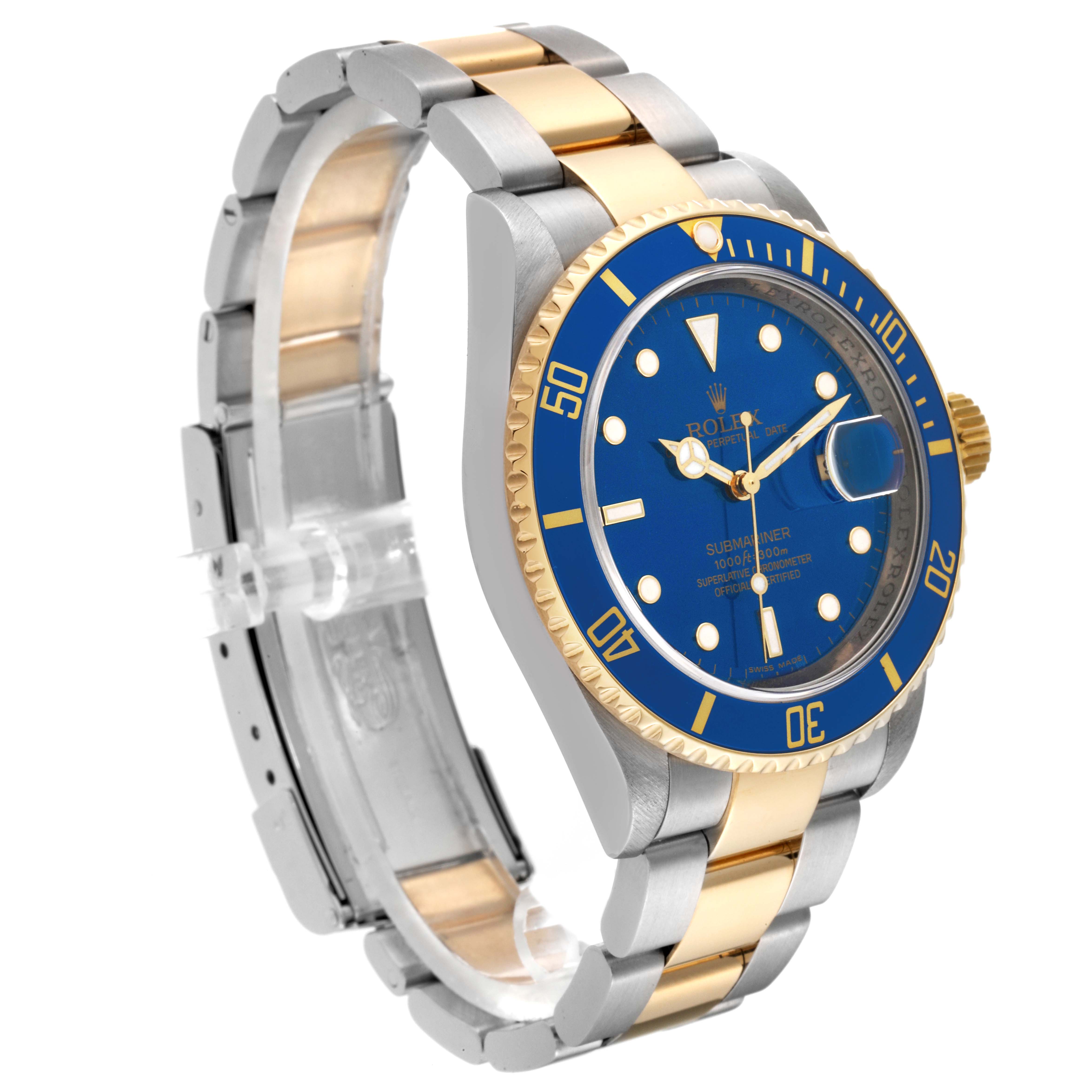 The image shows a Rolex Submariner 16613 Men's Steel and Gold (two tone) Blue Dial 16613 Men's Steel and Gold (two tone) Blue Dial watch at a three-quarter angle, highlighting its blue dial, gold bezel, and two-tone band.