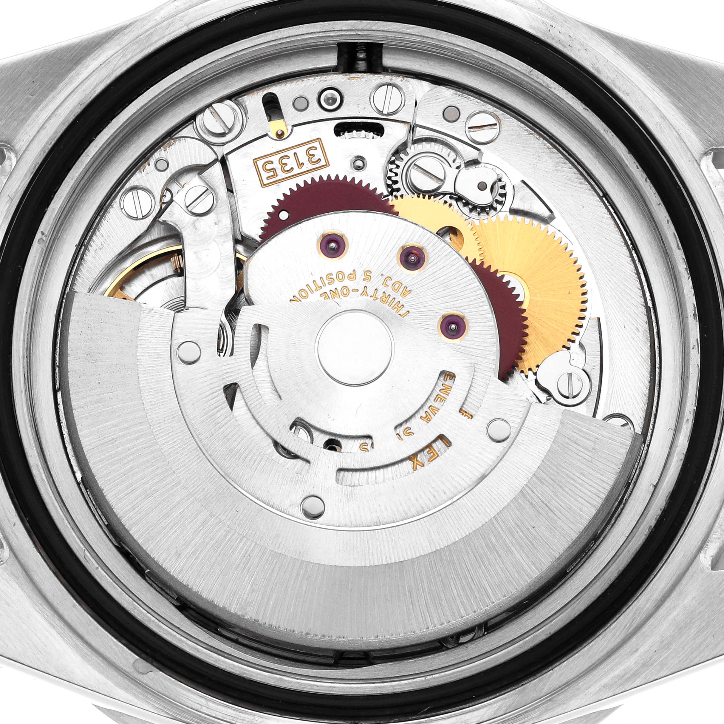 The image shows the movement mechanism of a Rolex Submariner 16610 Men
s Stainless Steel Black Dial watch, viewed from the back with visible gears and components.