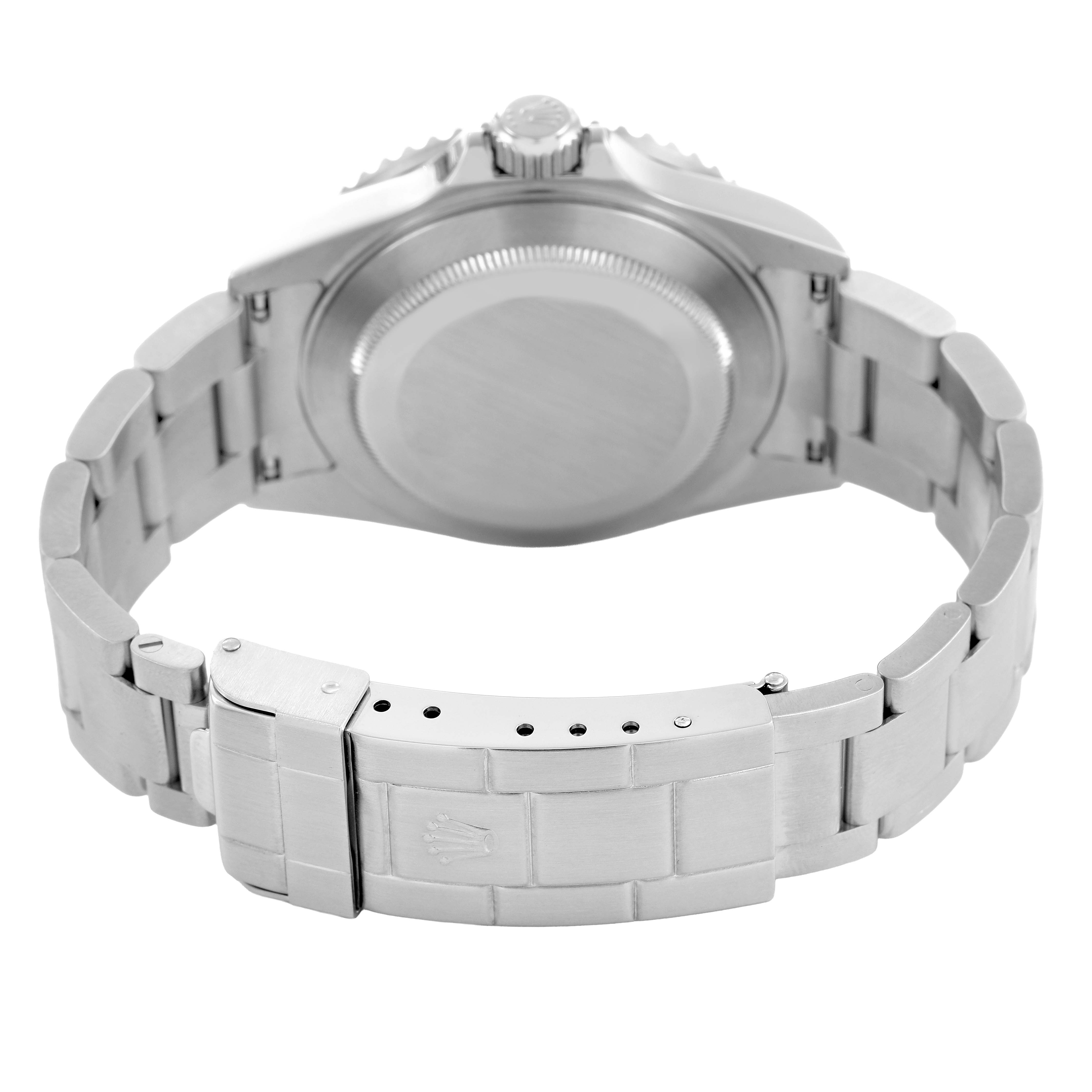 The image shows the back of a Rolex Submariner 16610 Men's Stainless Steel Black Dial watch, highlighting the case back, bracelet, and clasp.