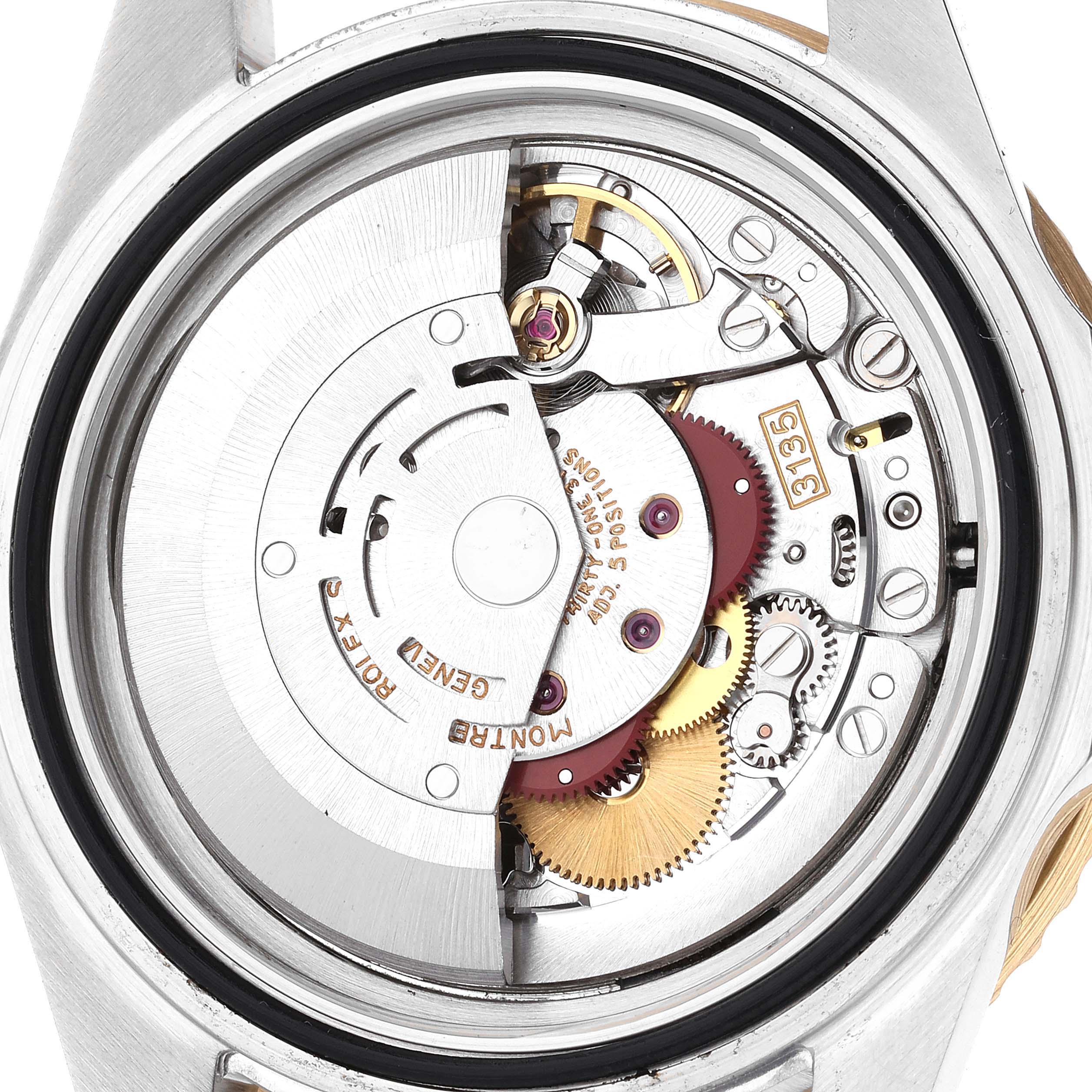 This image shows the internal mechanical movement of a Rolex Submariner 16613 Men's Steel and Gold (two tone) Black Dial 16613 Men's Steel and Gold (two tone) Black Dial watch viewed from the back.