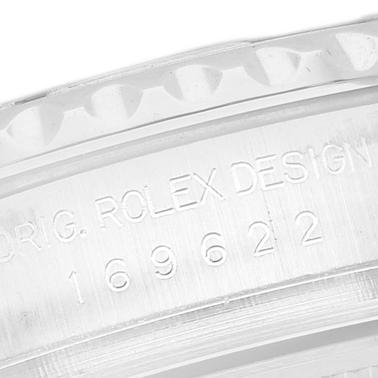 The image shows a close-up of the engraving on the side of a Rolex Yacht-Master 169622 Women
s Stainless Steel Silver Dial watch case.