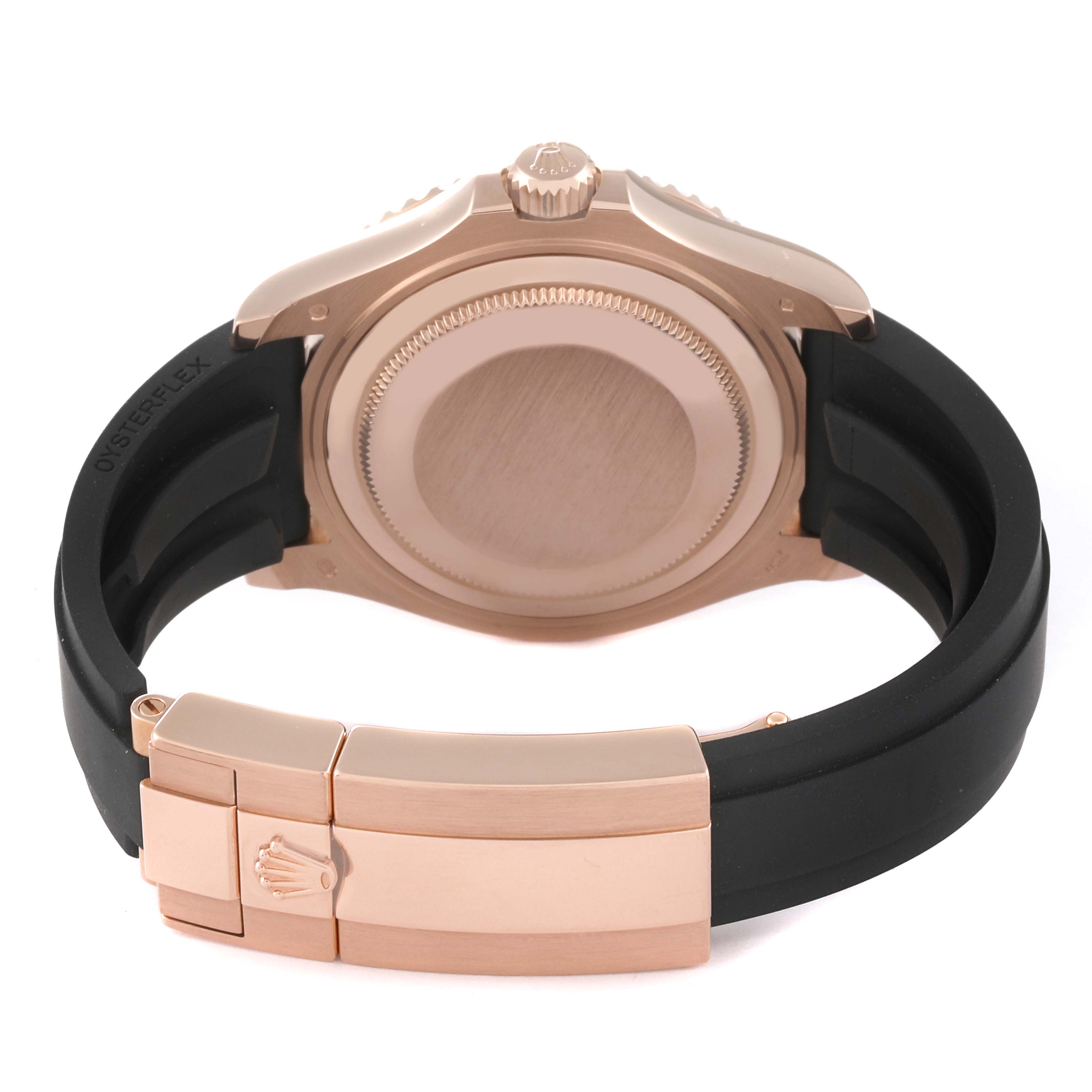 The image shows the back view of a Rolex Yacht-Master 268655 Men's Rose Gold Black Dial 268655 Men's Rose Gold Black Dial watch with its case, crown, and clasp on the rubber strap visible.
