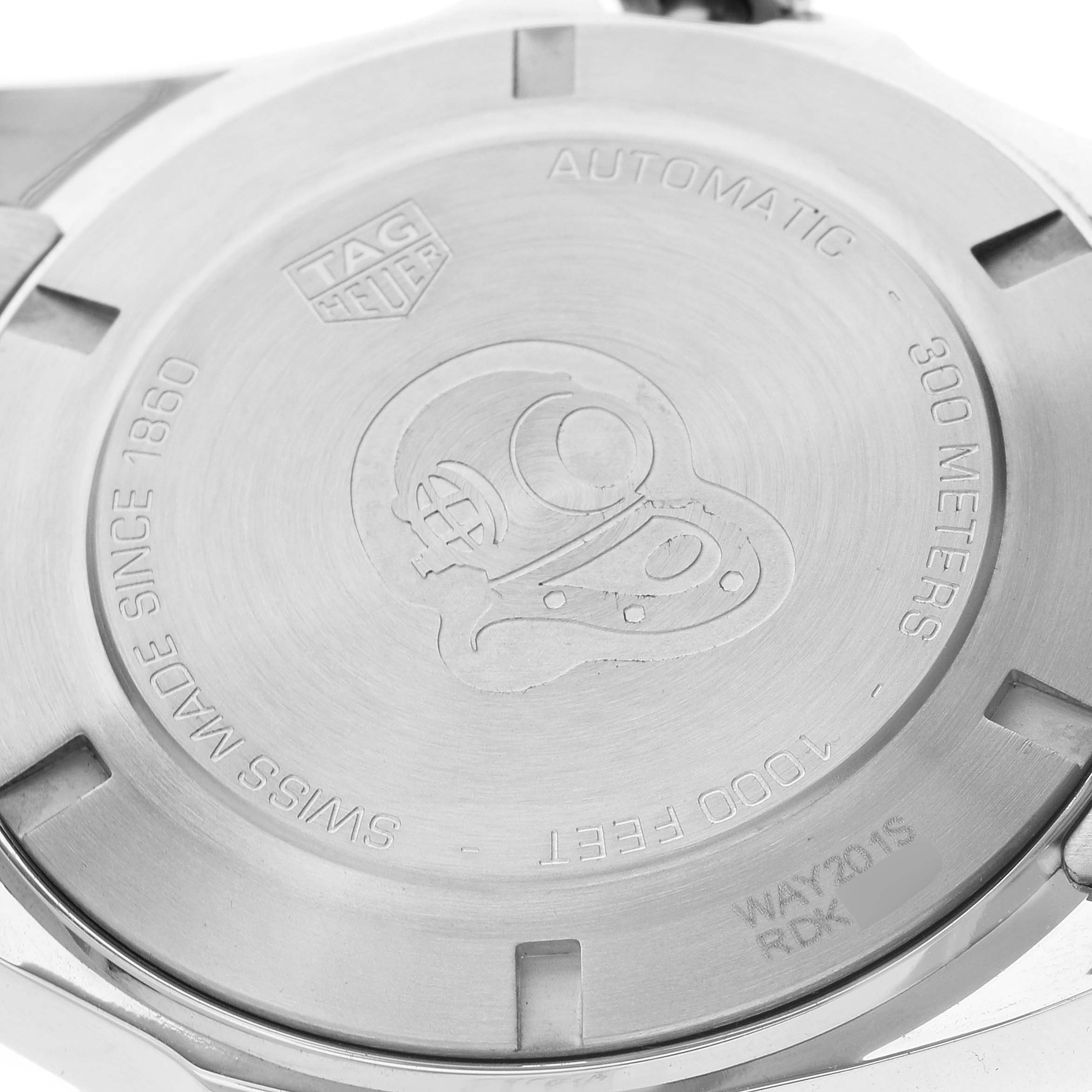 This image shows the case back of a Tag Heuer Aquaracer WAY2015.BA0927 Men's Stainless Steel Green Dial WAY2015.BA0927 Men's Stainless Steel Green Dial watch, displaying details like water resistance and the brand logo.