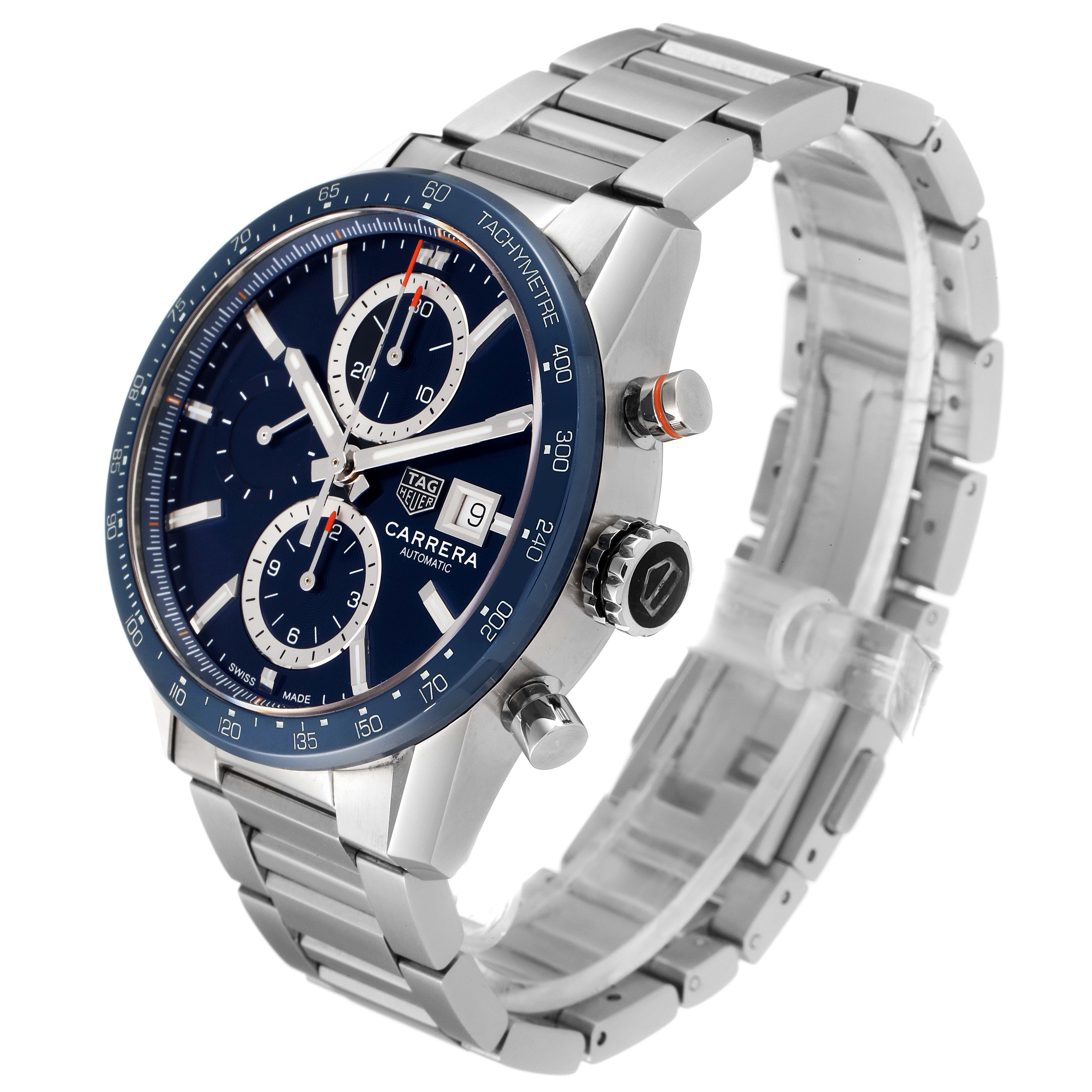 The image shows a Tag Heuer Carrera CBM2112.BA0651 Men's Stainless Steel Blue Dial CBM2112.BA0651 Men's Stainless Steel Blue Dial watch at a 3/4 angle, highlighting the face, chronograph dials, date window, and the metal bracelet.
