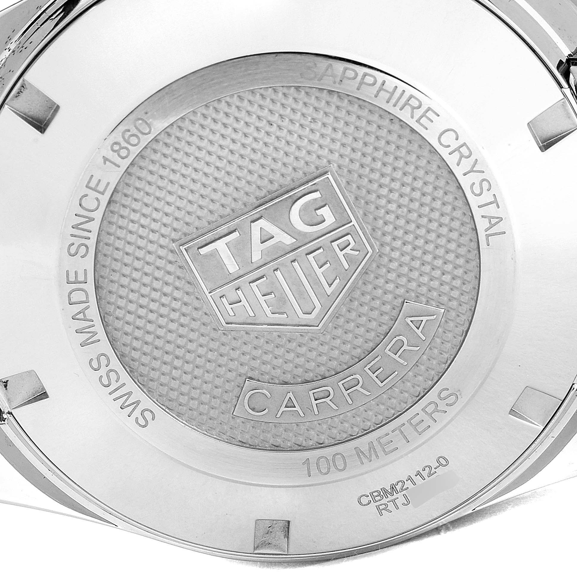 The image shows the back case of a Tag Heuer Carrera CBM2112.BA0651 Men's Stainless Steel Blue Dial CBM2112.BA0651 Men's Stainless Steel Blue Dial watch, highlighting the brand logo and specifications.