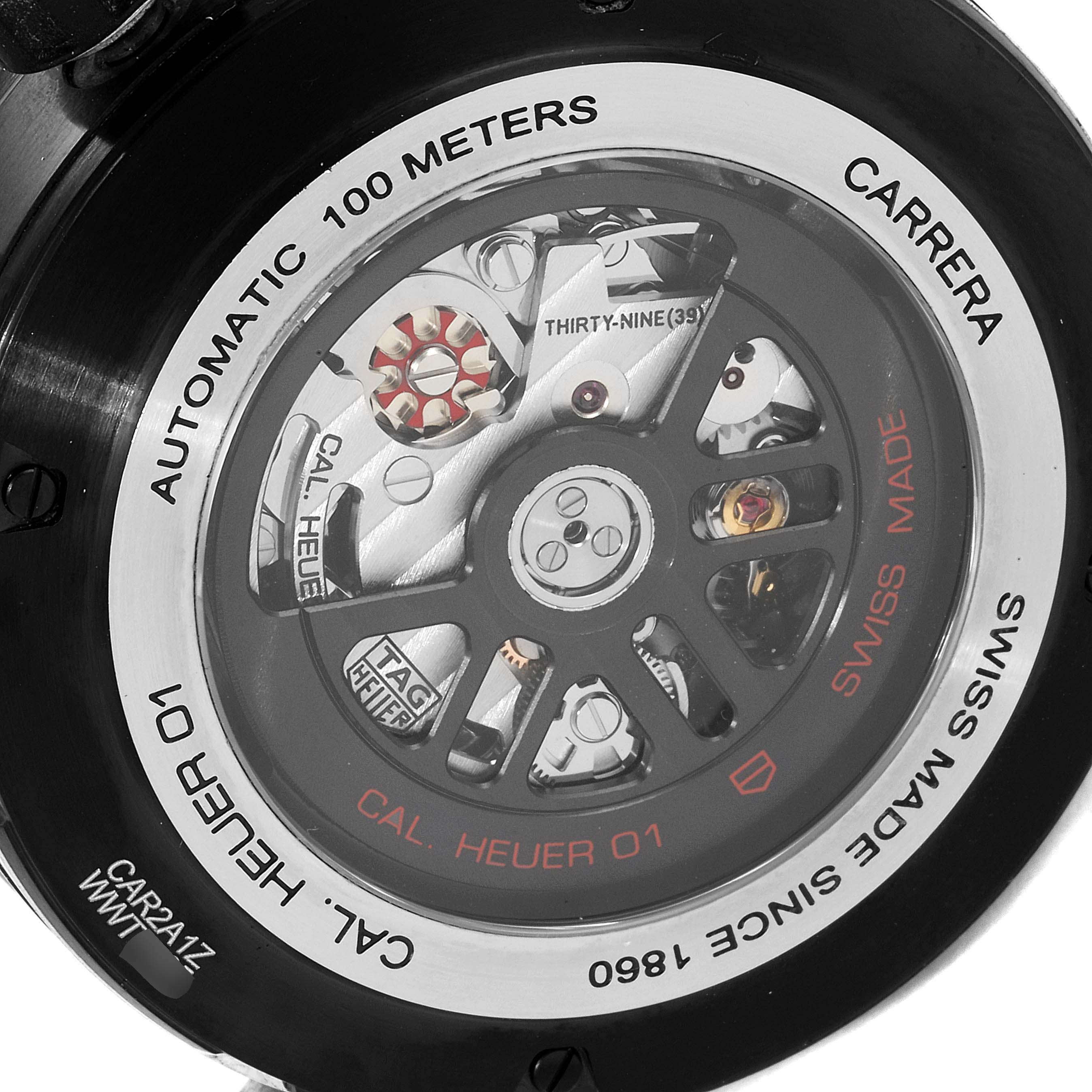 The image shows the back of a Tag Heuer Carrera CAR2A1Z.FT6051 Men
s Stainless Steel Black Dial CAR2A1Z.FT6051 Men
s Stainless Steel Black Dial model watch, displaying the internal mechanism and Cal. Heuer 01 movement.