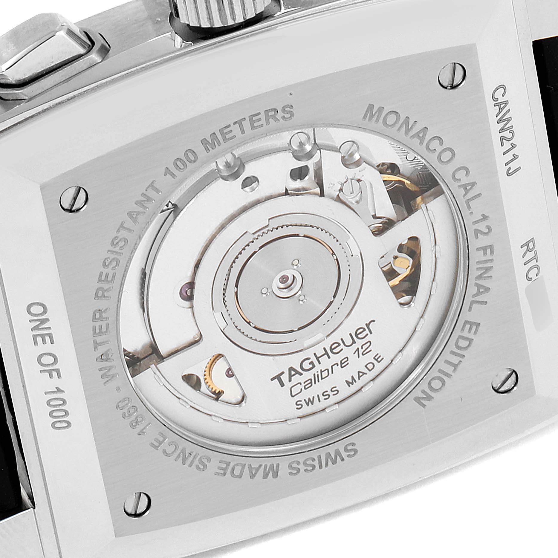 This image shows the back view of the Tag Heuer Monaco watch, highlighting its mechanical movement and engravings.