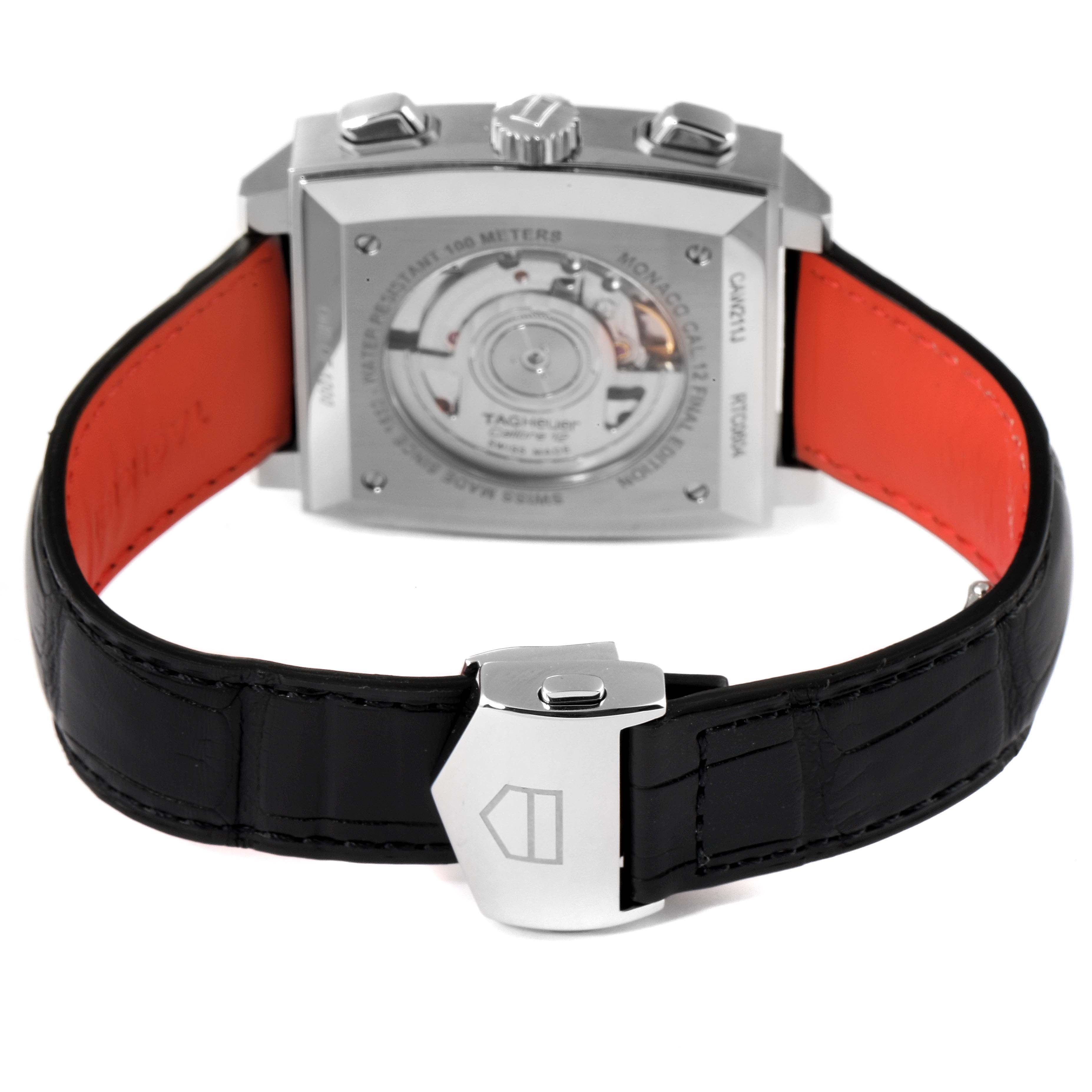 The image shows the back view of the Tag Heuer Monaco model watch, highlighting its movement and clasp.