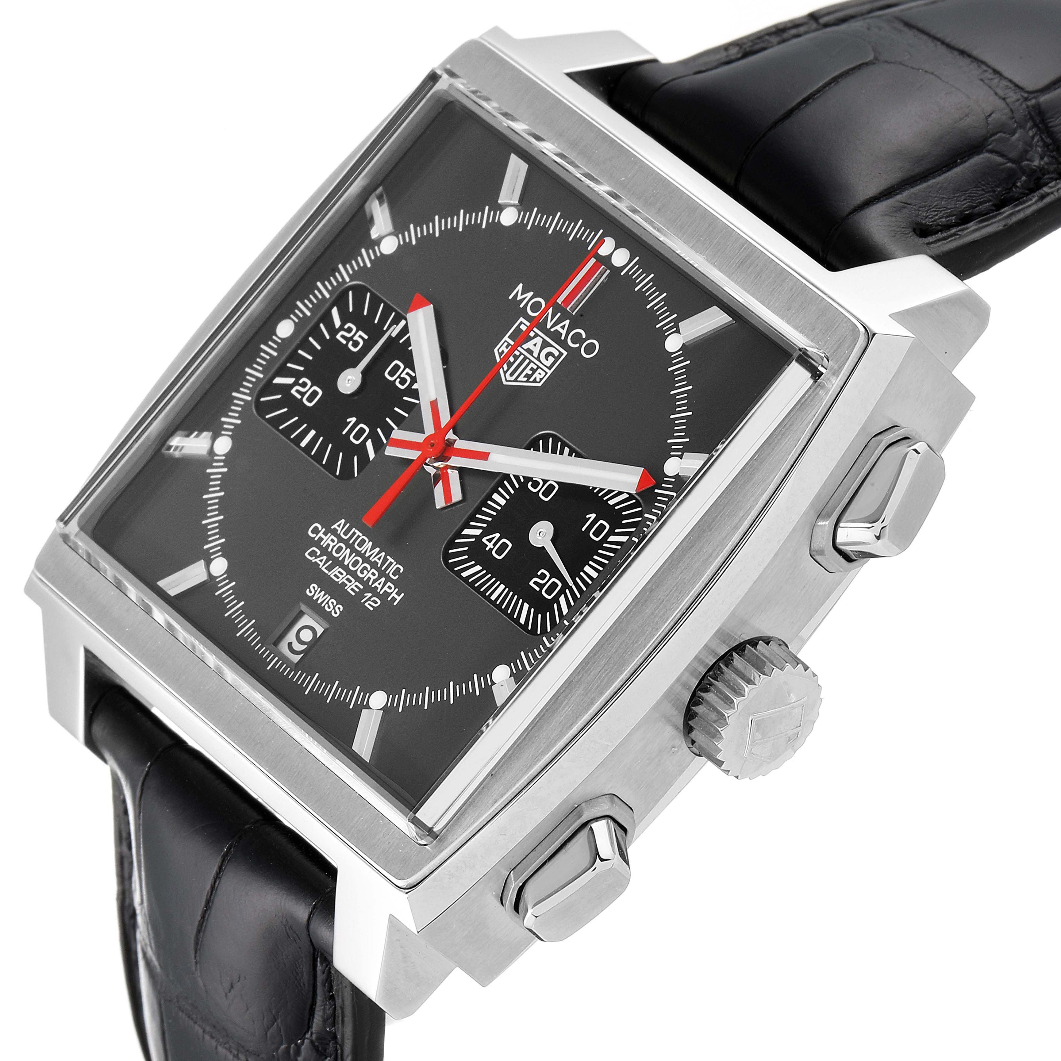 This image shows a Tag Heuer Monaco watch at a tilted angle, highlighting the dial, crown, pushers, and black leather strap.
