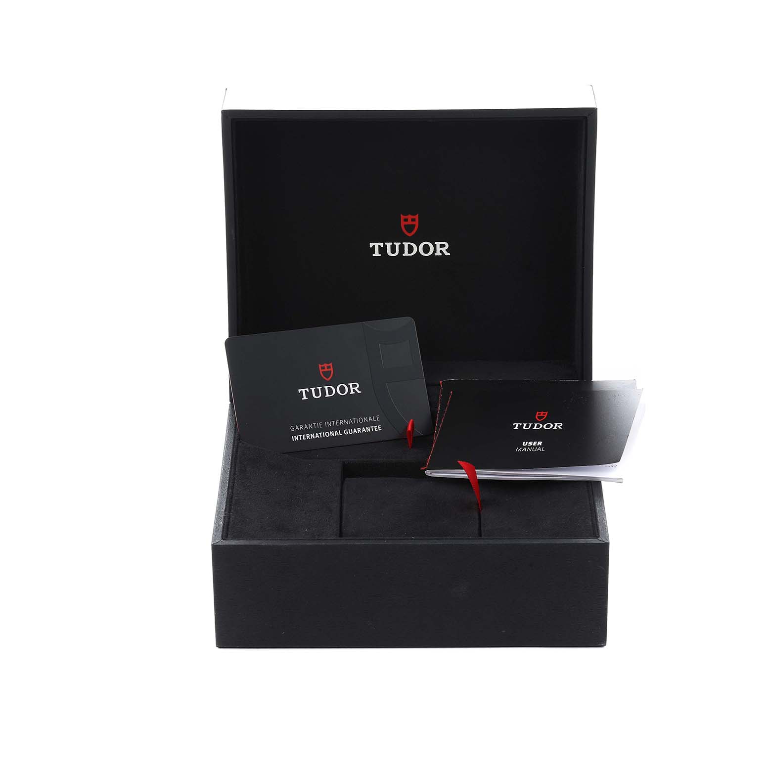 The image shows a Tudor Heritage Black Bay 79360 Men
s Stainless Steel Silver Dial watch box with a guarantee card and user manual.