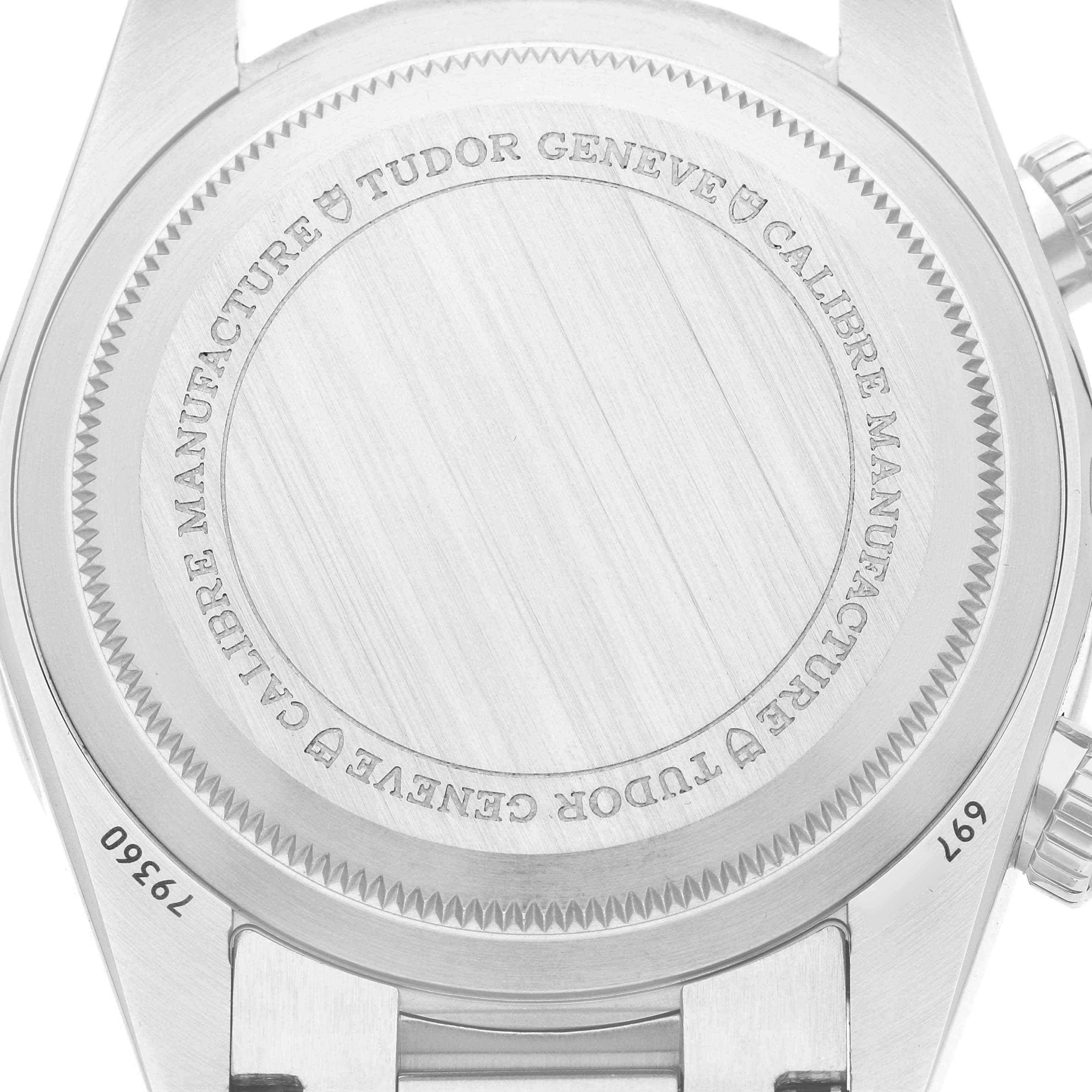 The image shows the case back of the Tudor Heritage Black Bay 79360 Men
s Stainless Steel Silver Dial watch, displaying engraved details.