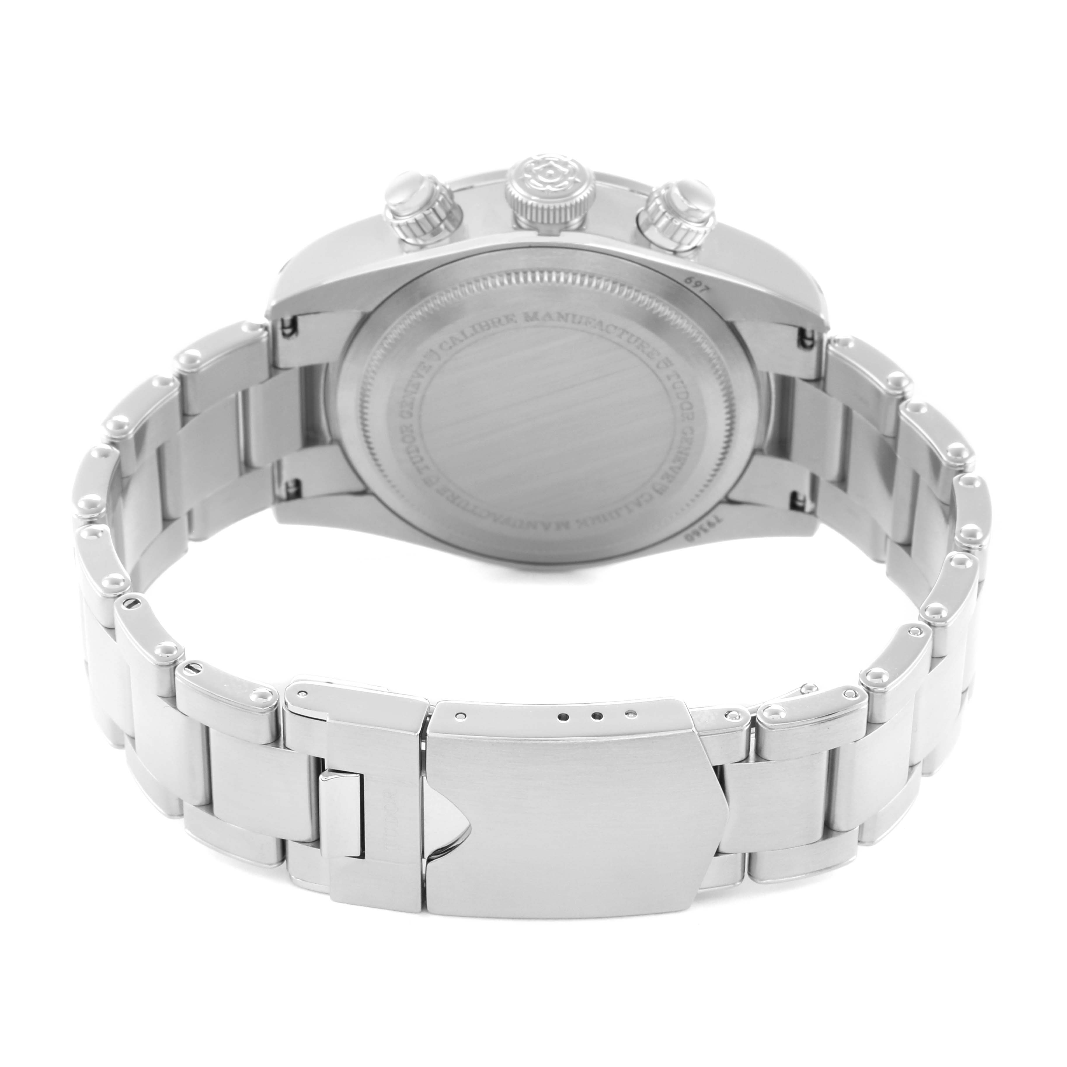 The image shows the back of a Tudor Heritage Black Bay 79360 Men
s Stainless Steel Silver Dial watch, highlighting the case back, crown, pushers, and bracelet.