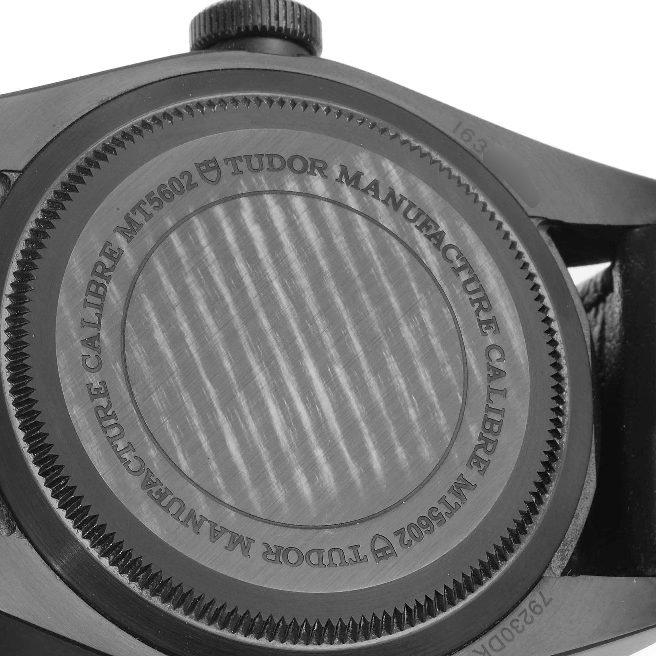 This image shows the back of the Tudor Heritage Black Bay 79230DK Men's Stainless Steel Black Dial 79230DK Men's Stainless Steel Black Dial watch, highlighting the screw-down case back and engraved details.