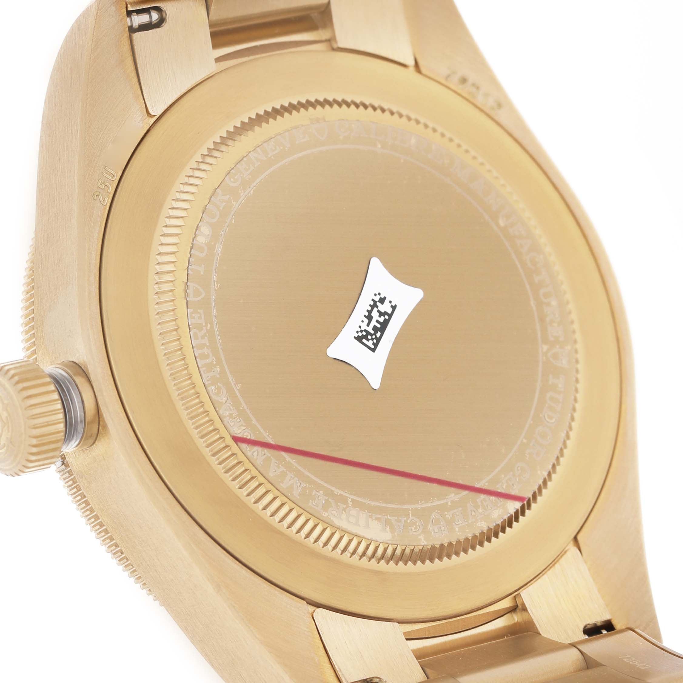 The image shows the back of a Tudor Heritage Black Bay M79012M-0001 Men's Bronze Brown Dial watch, highlighting the crown and caseback.